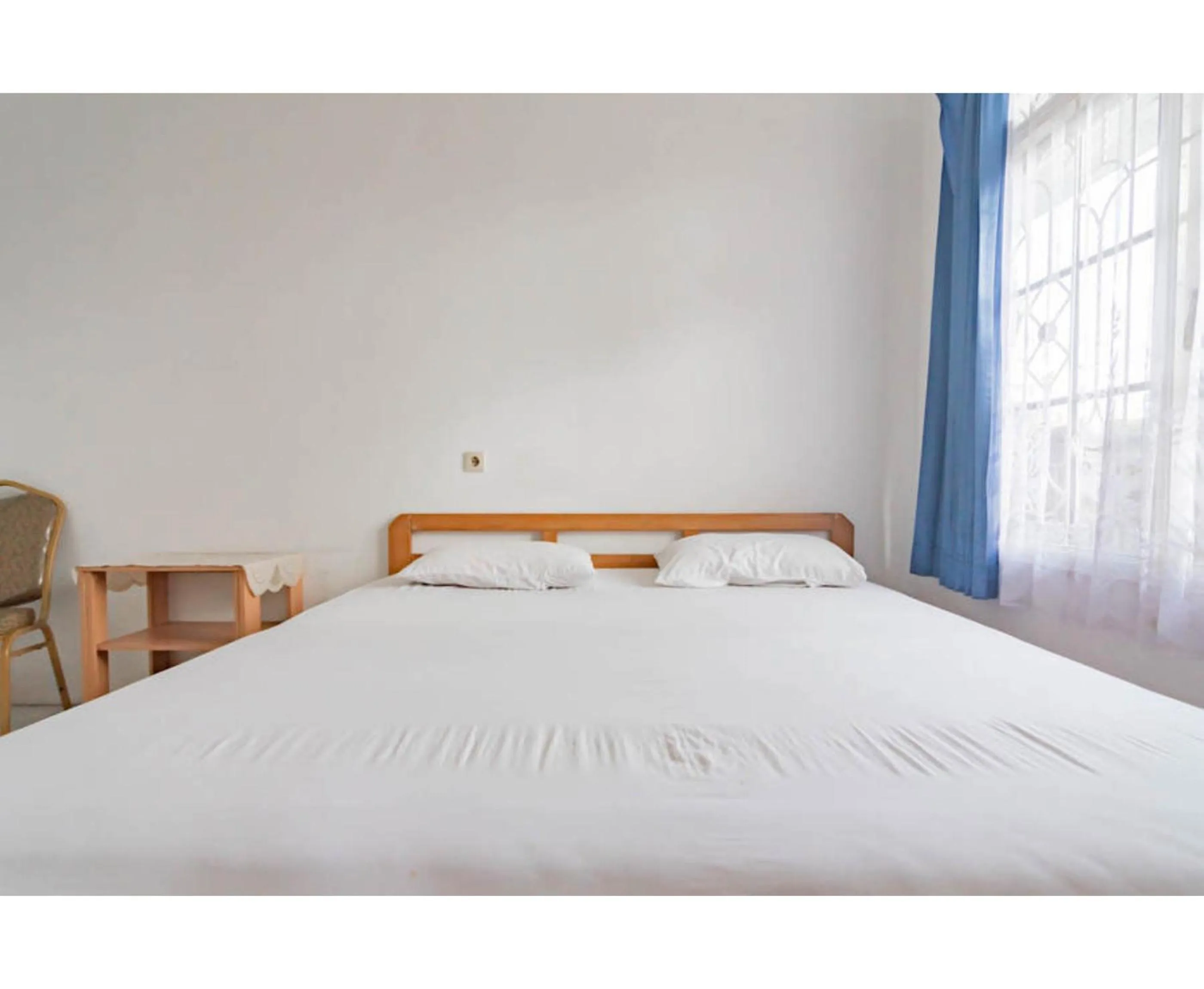 Bedroom, Bed in Pall Inn Puncak Mitra RedDoorz