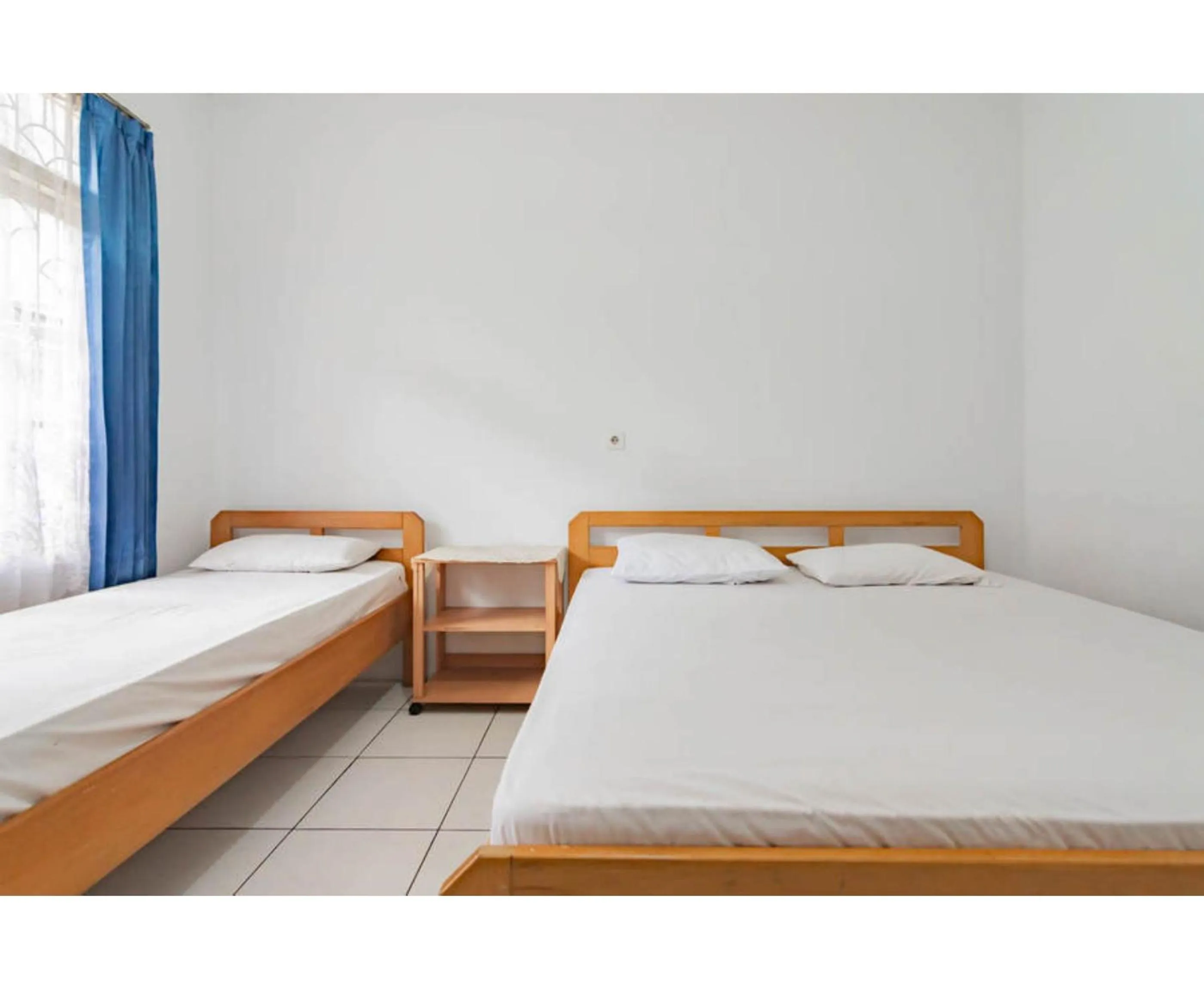 Bedroom, Bed in Pall Inn Puncak Mitra RedDoorz
