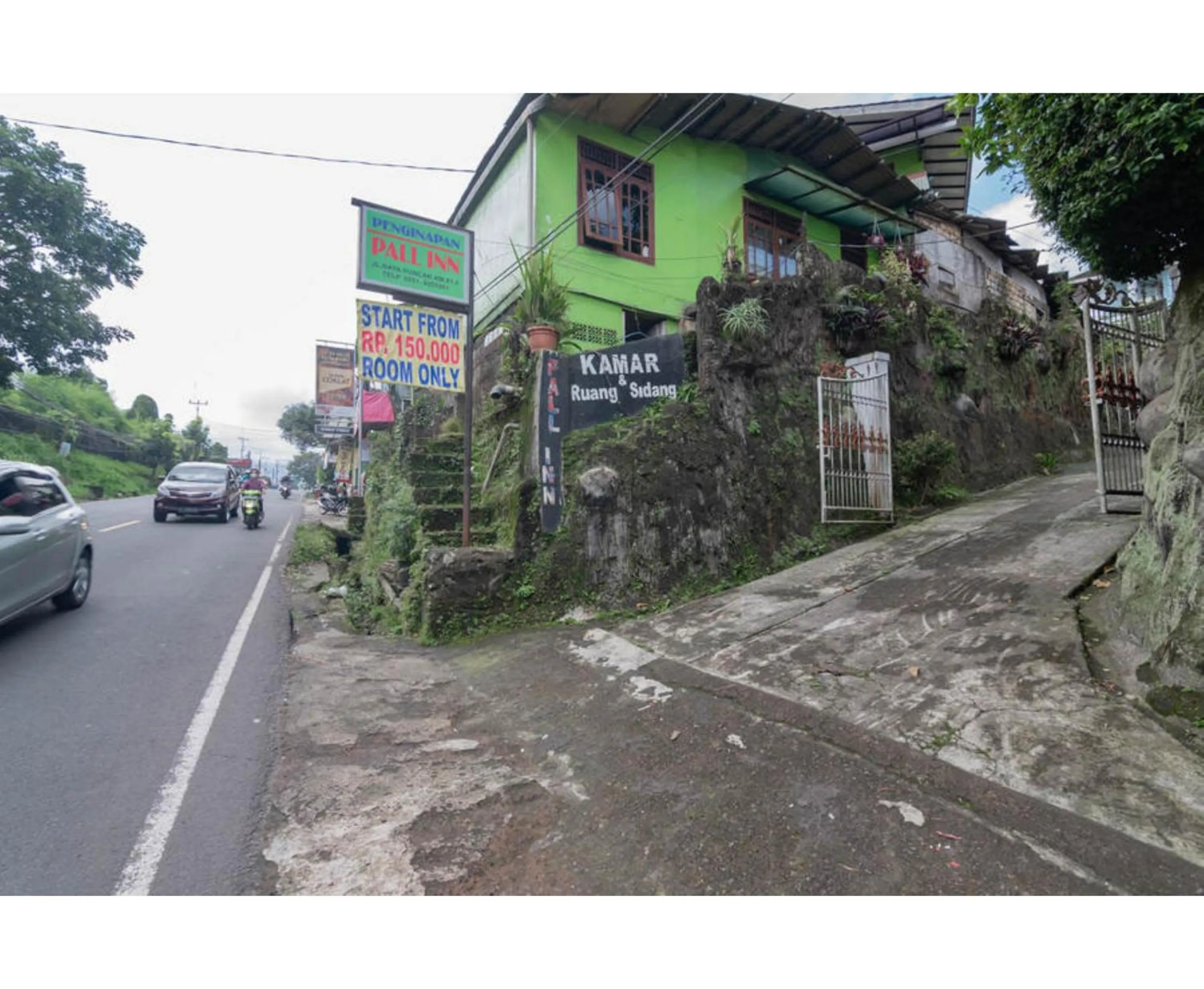 Property building in Pall Inn Puncak Mitra RedDoorz
