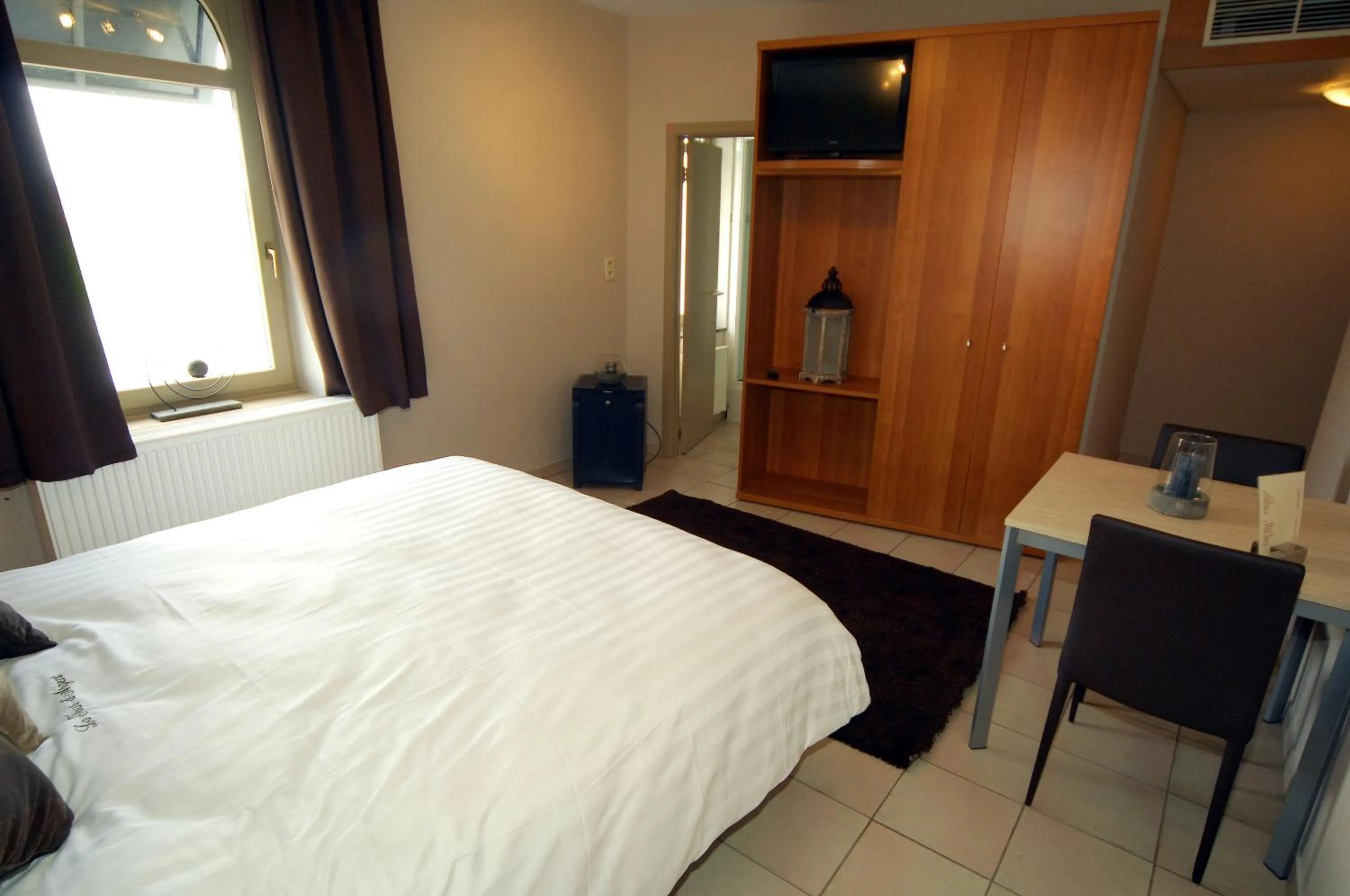 Bed in Hôtel Le Saint Loup