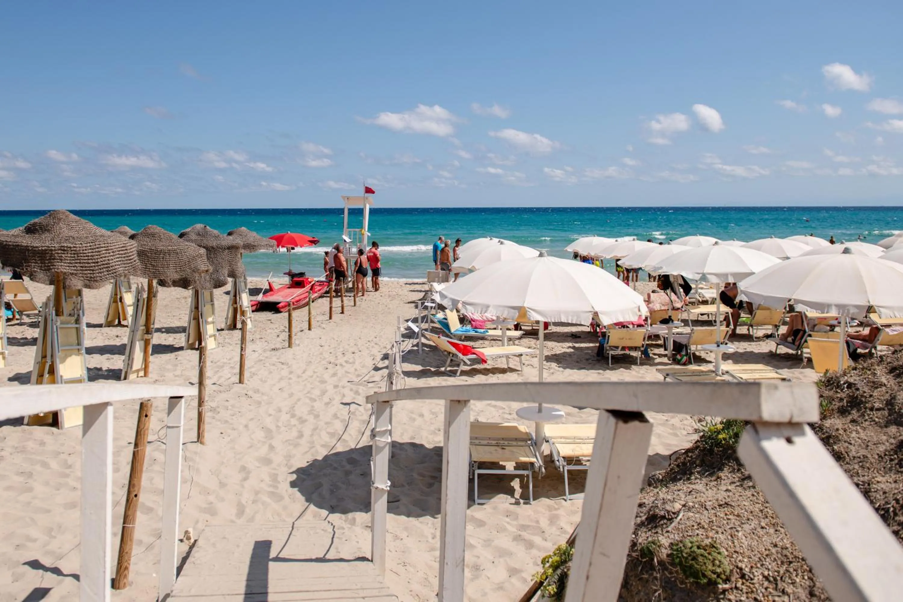 Beach in Amareclub Baia Dei Turchi Resort - Adults Only