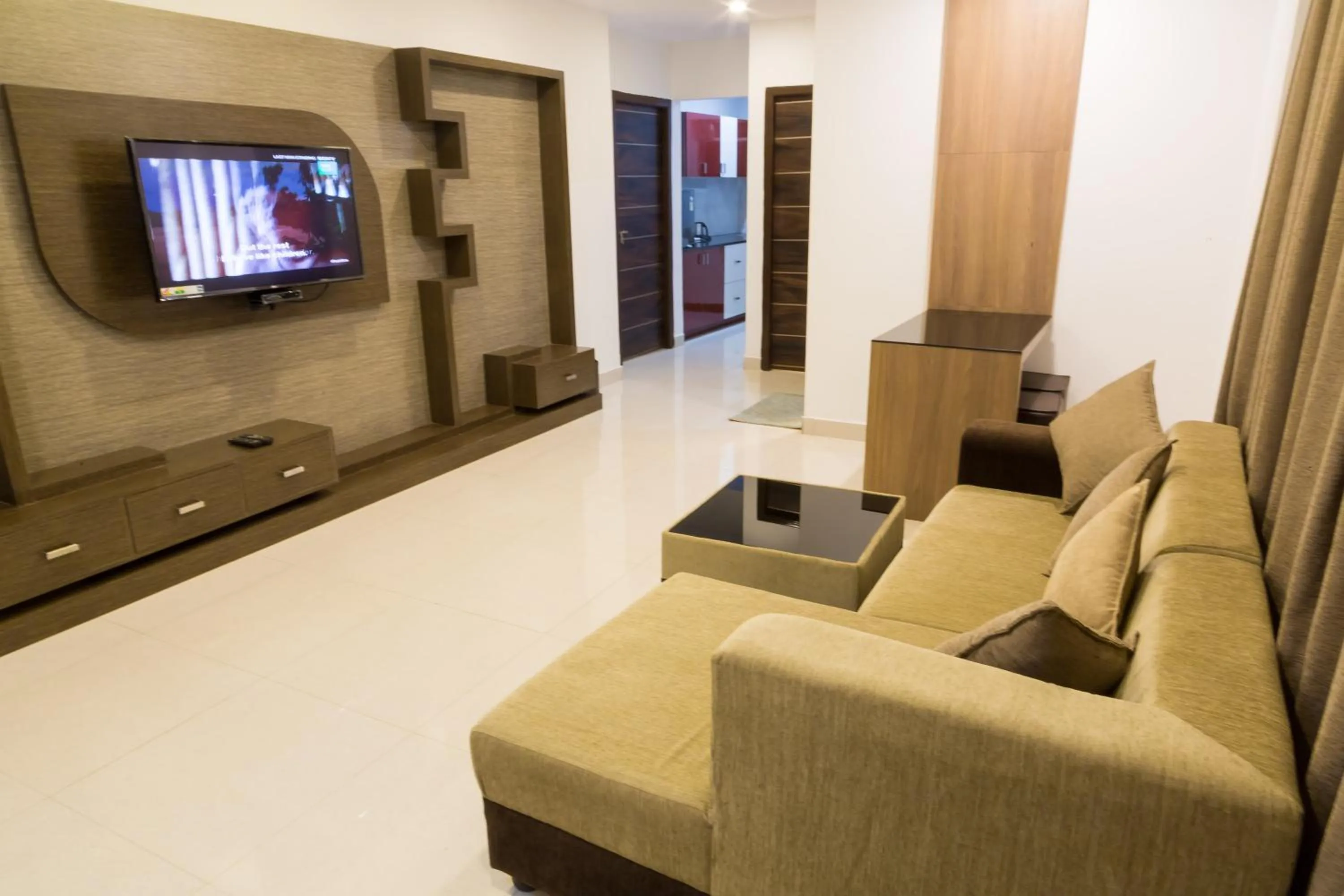 TV and multimedia in The Porch Inn Hotel & Service Apartments Near Nimhans Hospital