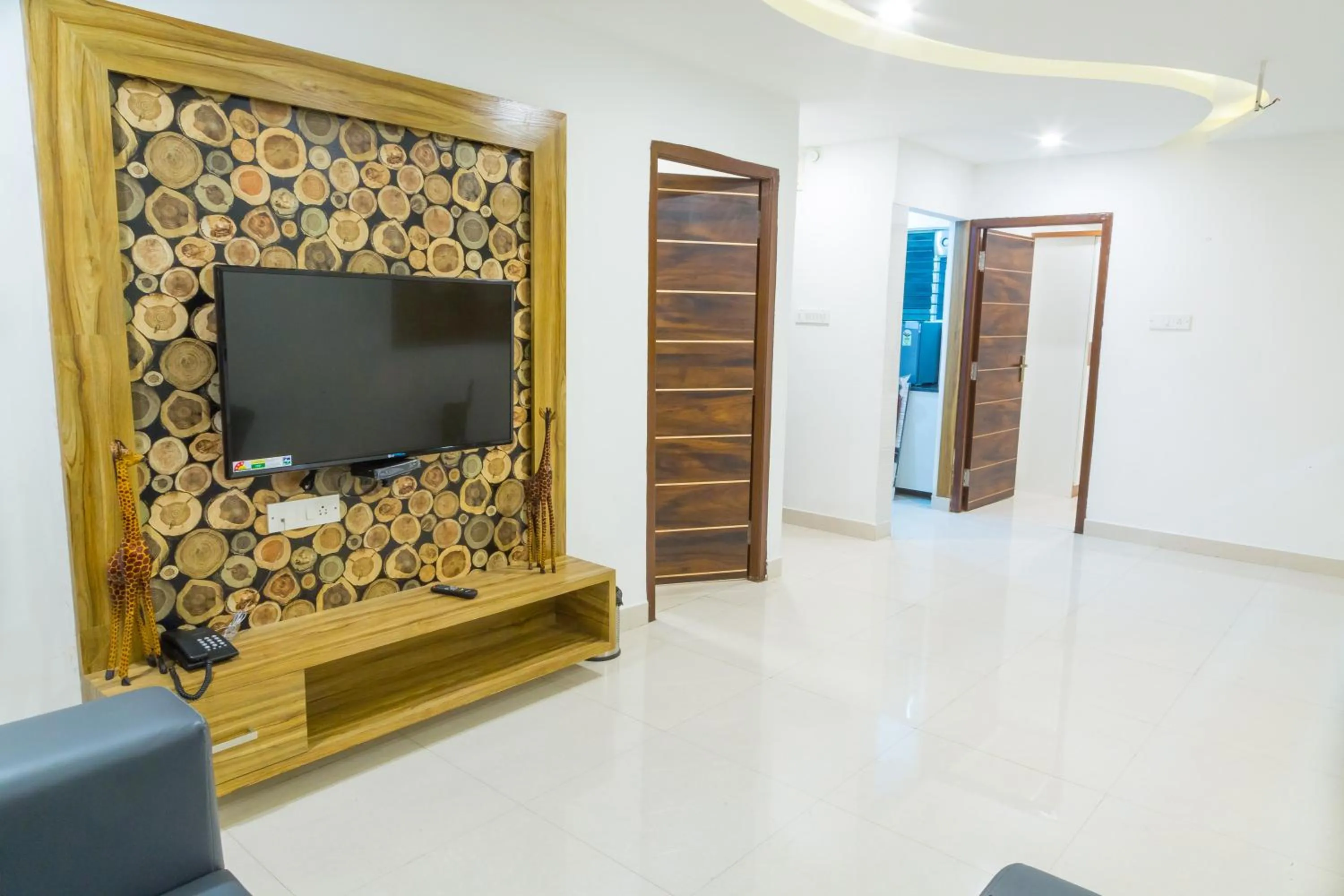 TV and multimedia in The Porch Inn Hotel & Service Apartments Near Nimhans Hospital
