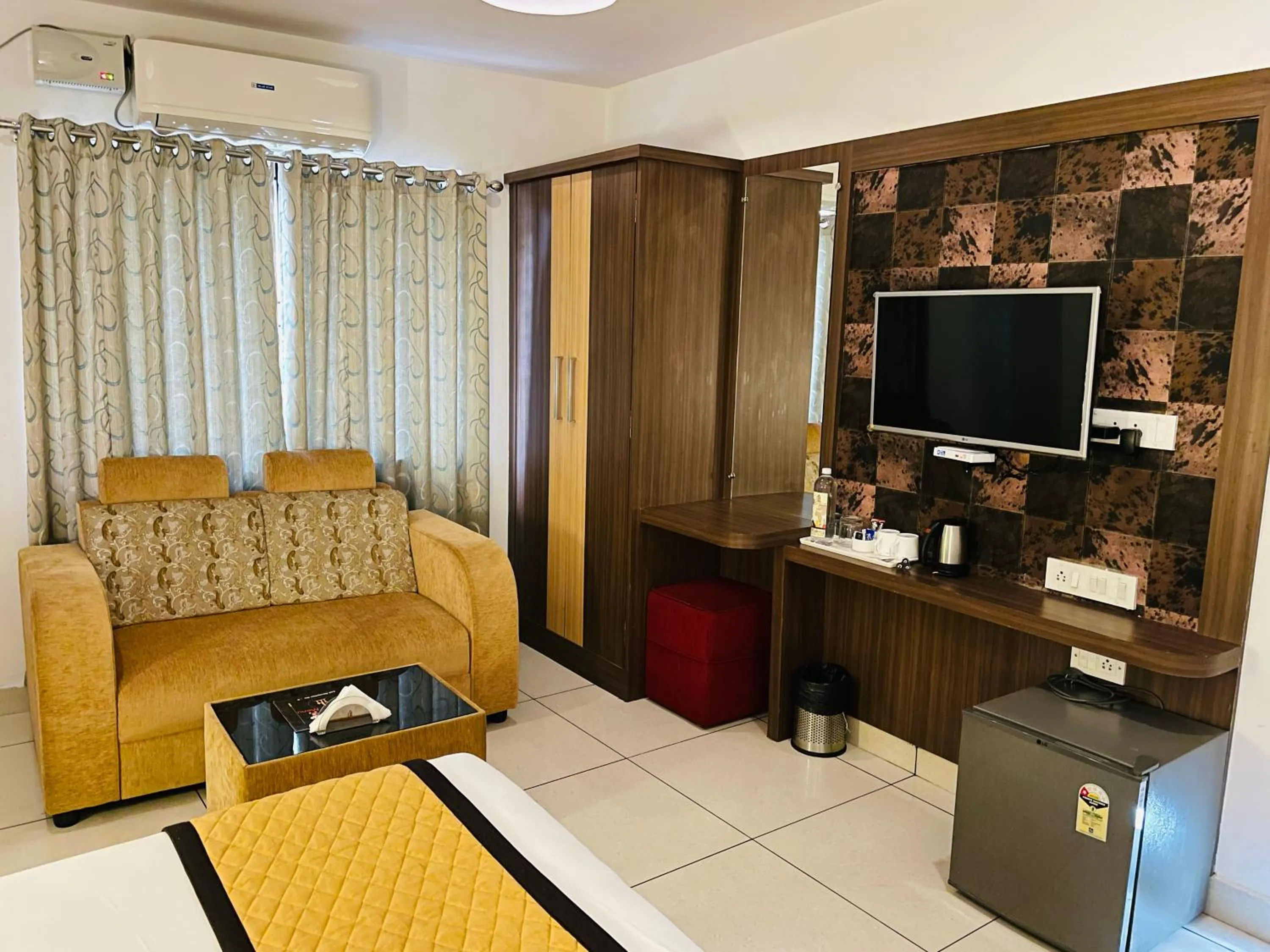 Bedroom in The Porch Inn Hotel & Service Apartments Near Nimhans Hospital