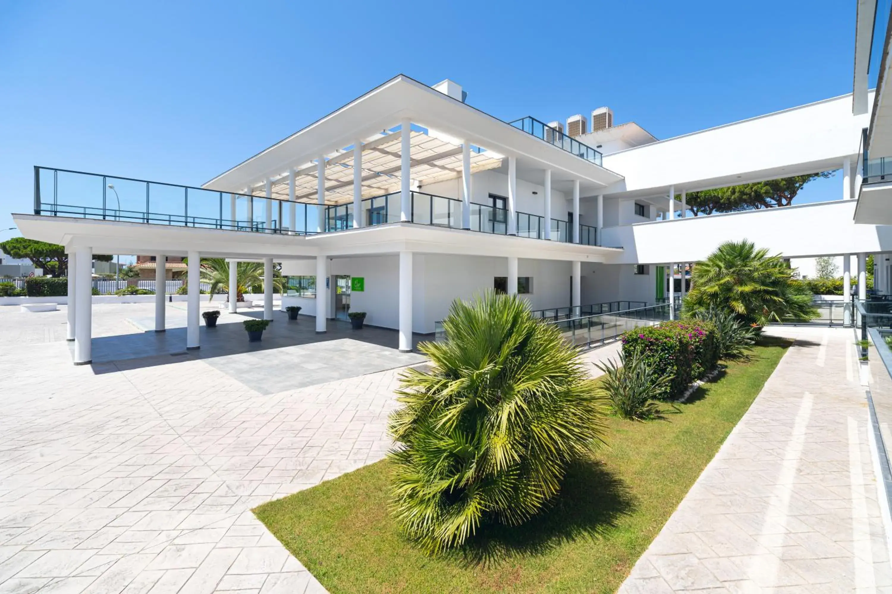 Facade/entrance in Complejo Al Sur - by Grupo Tribu Facade/entrance in Complejo Al Sur - by Grupo Tribu