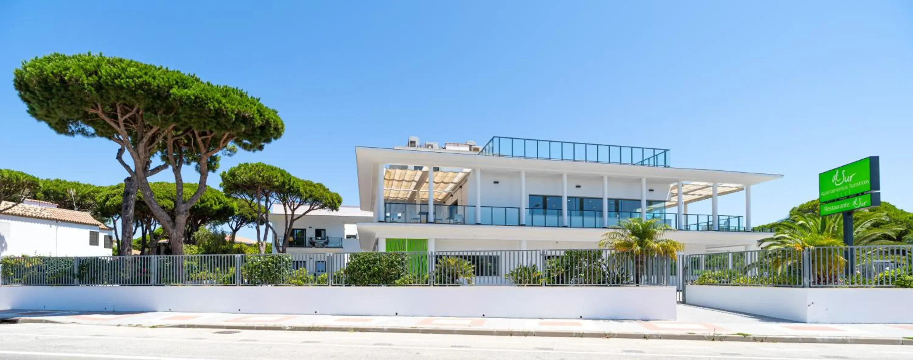 Facade/entrance in Complejo Al Sur - by Grupo Tribu Facade/entrance in Complejo Al Sur - by Grupo Tribu