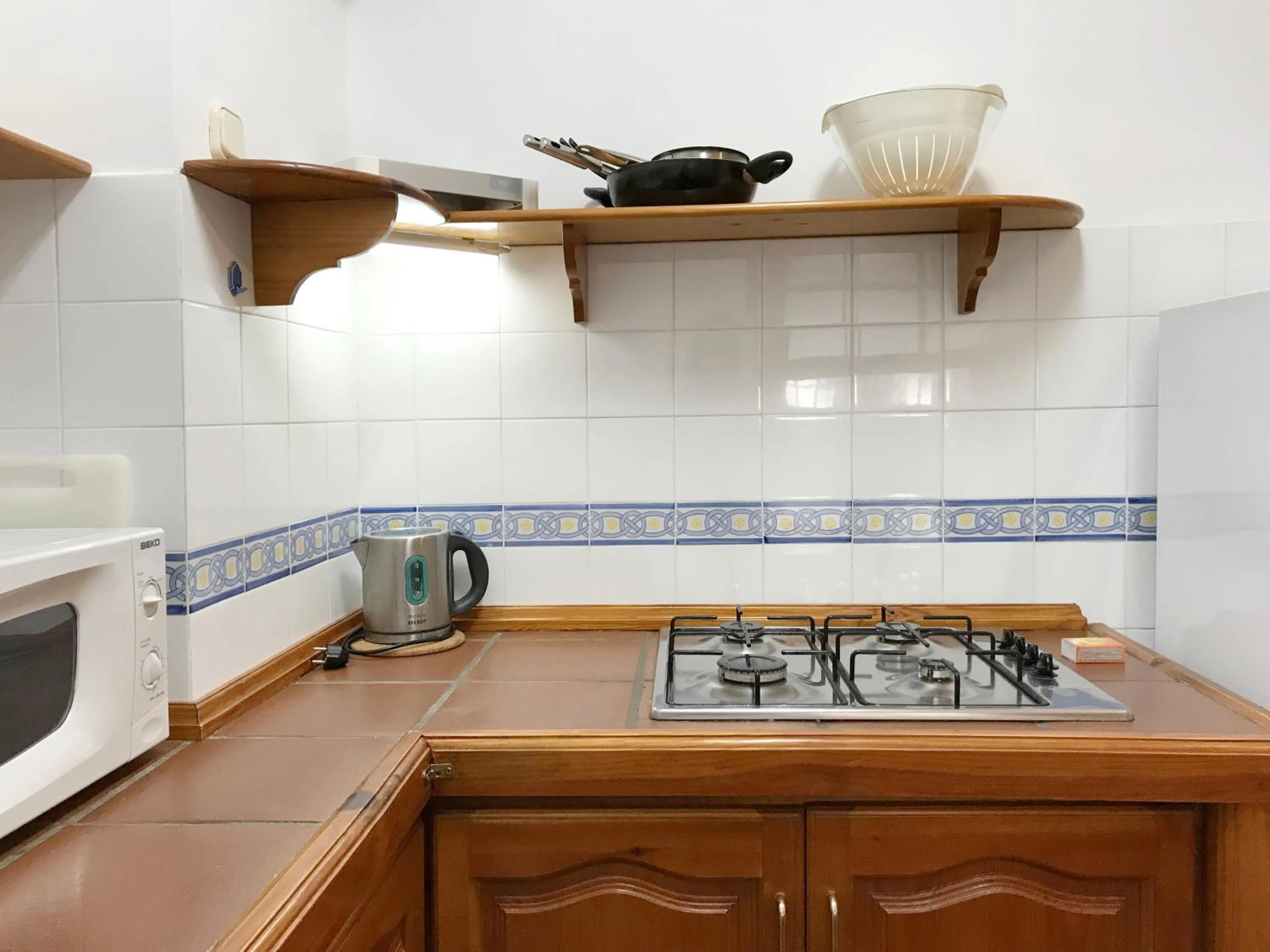 Kitchen or kitchenette in Apartamentos Turísticos La Mundial