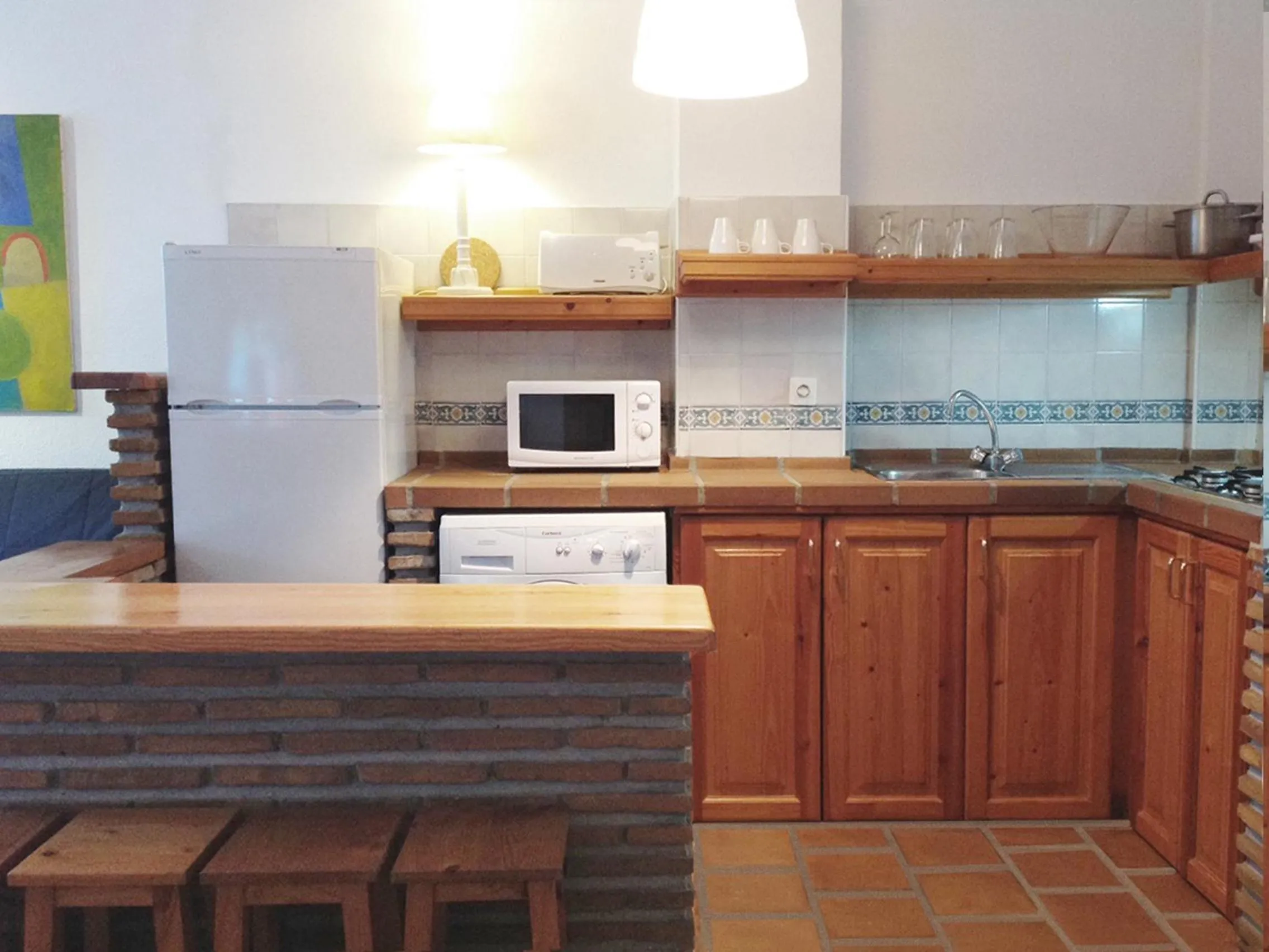 Kitchen or kitchenette in Apartamentos Turísticos La Mundial