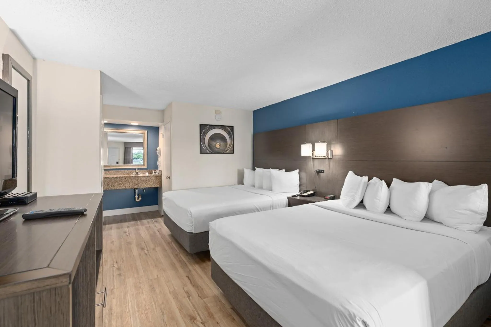 Bed in Baymont by Wyndham Orlando East