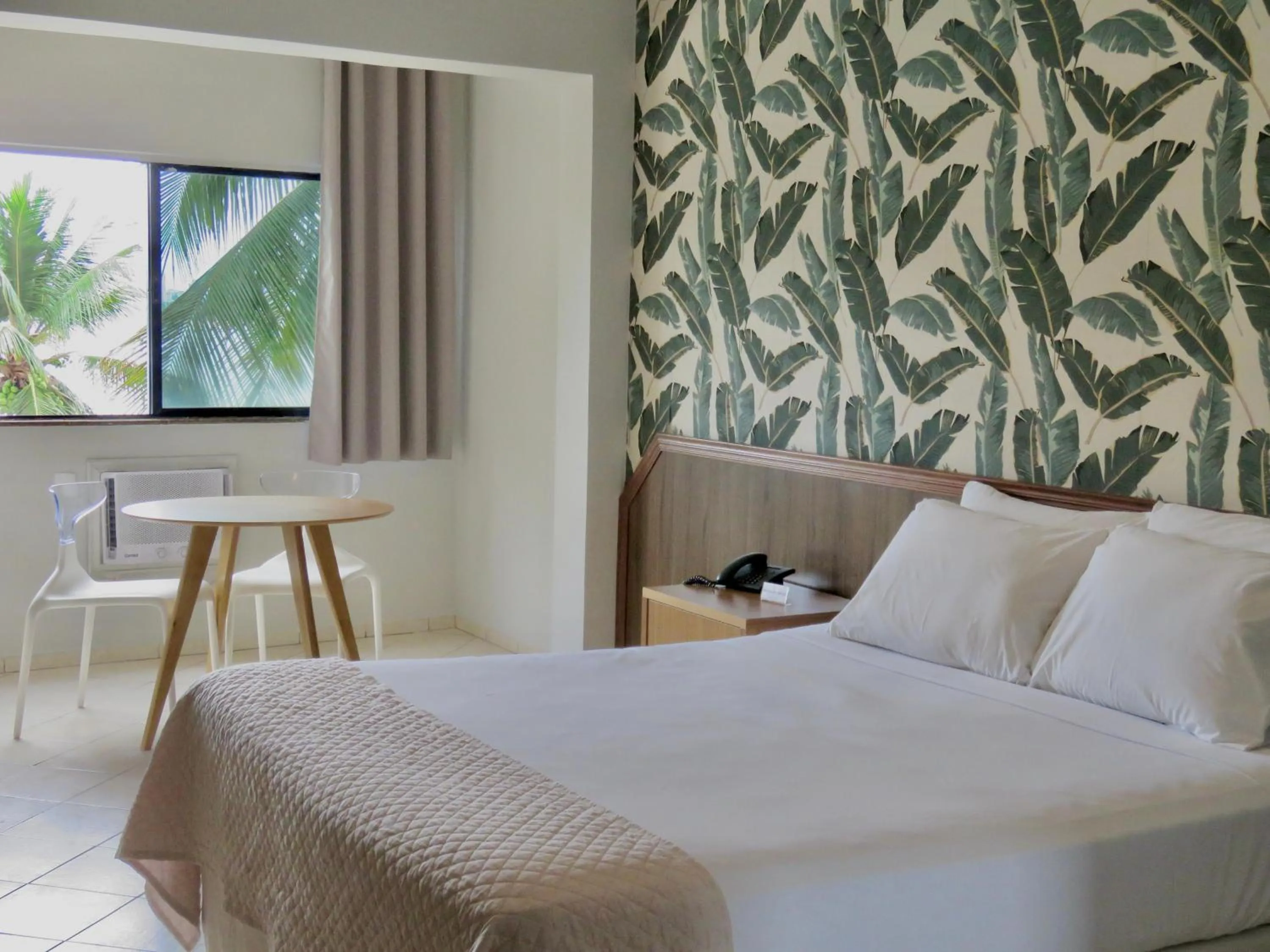 Bed in Ilha Porchat Hotel