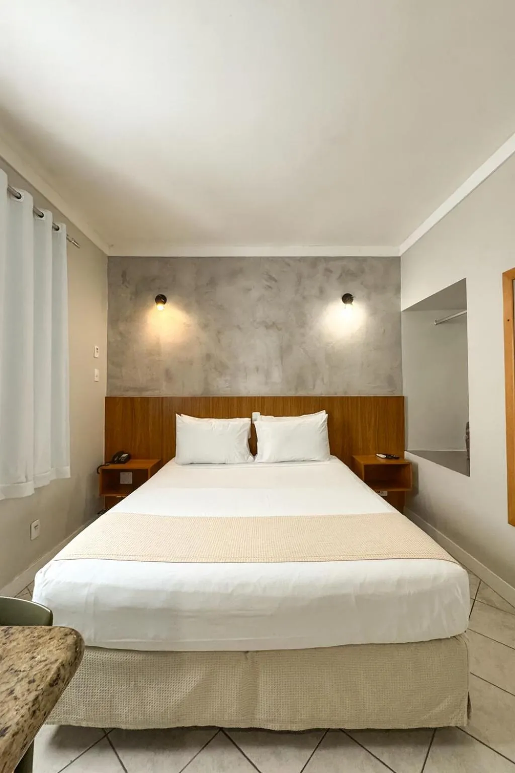 Bed in Ilha Porchat Hotel