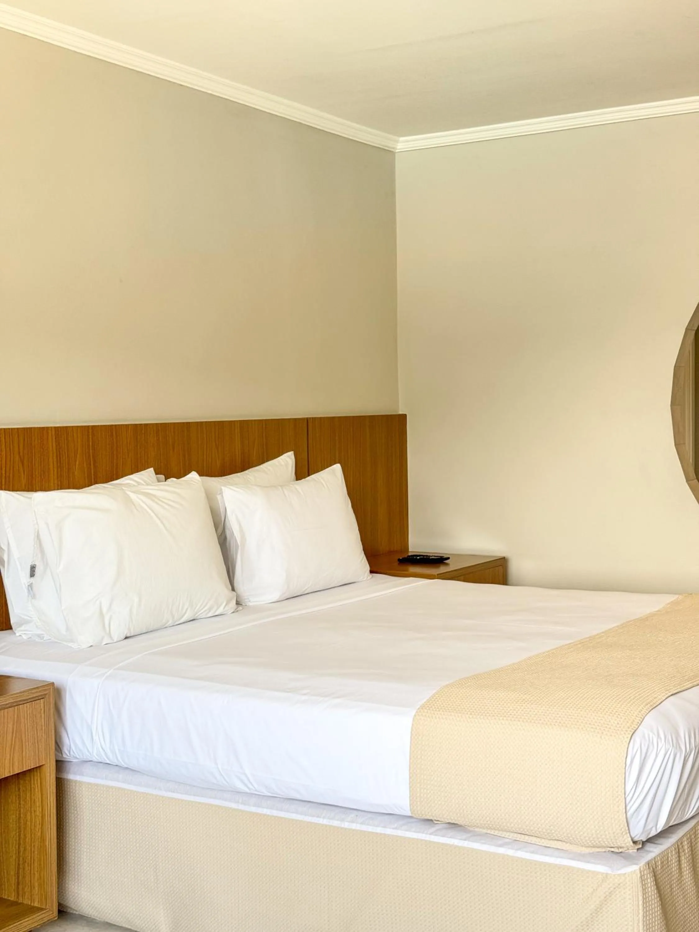 Bed in Ilha Porchat Hotel