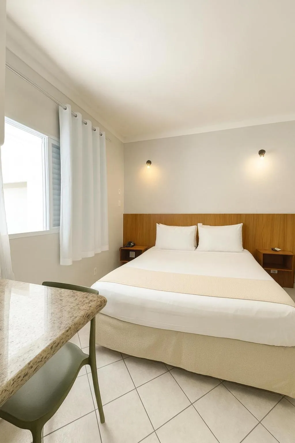 Bed in Ilha Porchat Hotel