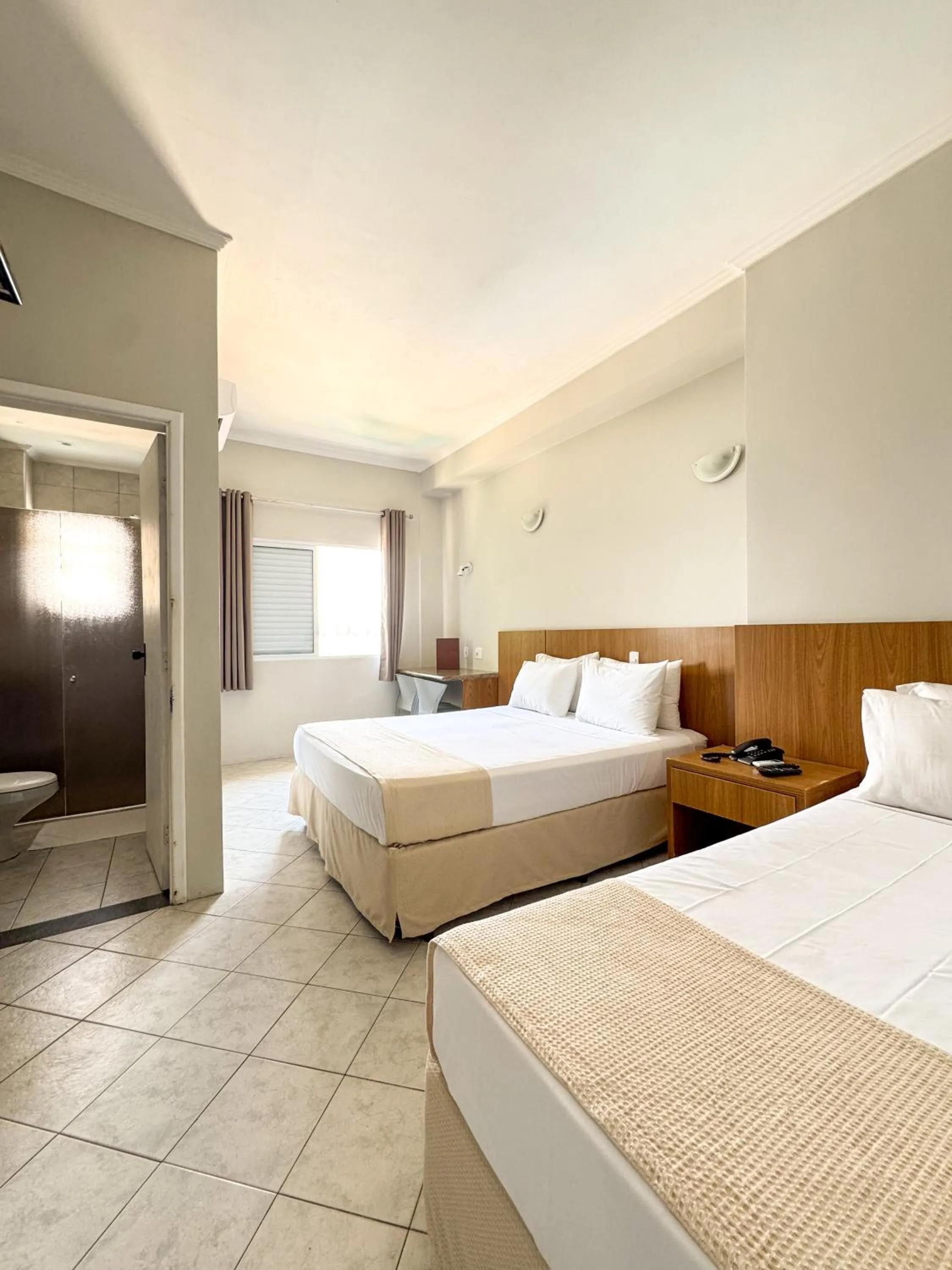 Photo of the whole room, Bed in Ilha Porchat Hotel