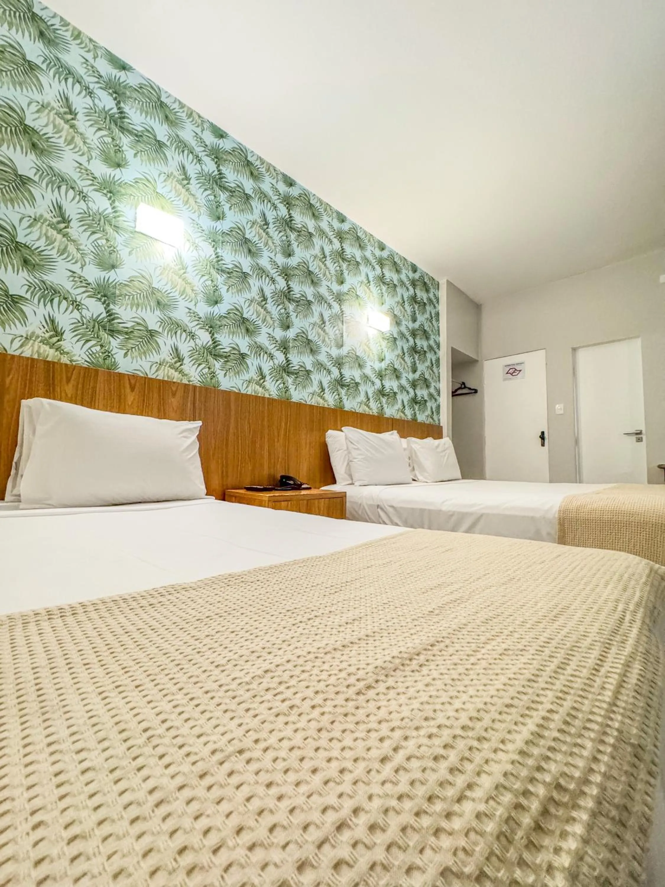 Photo of the whole room, Bed in Ilha Porchat Hotel