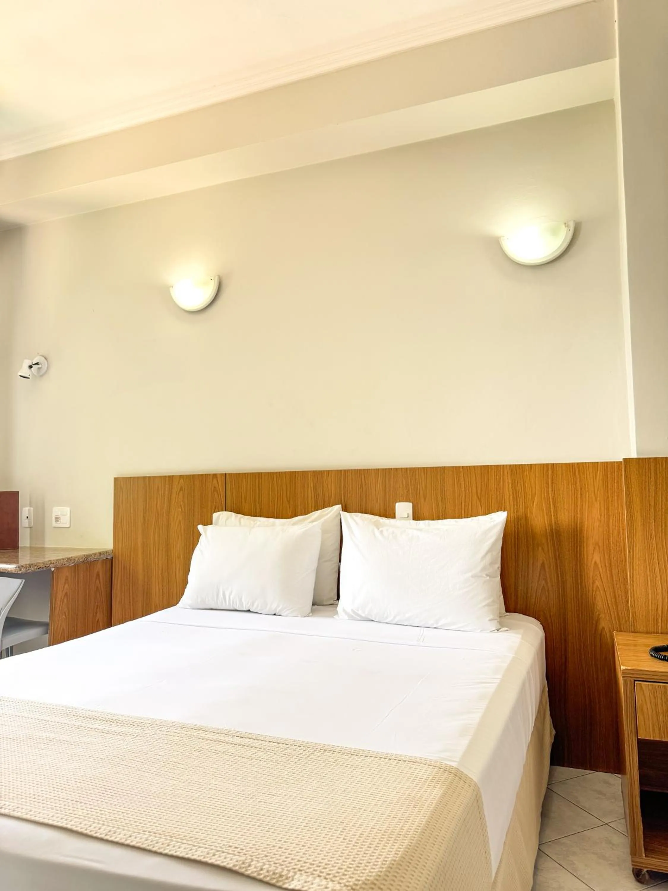 Bed in Ilha Porchat Hotel