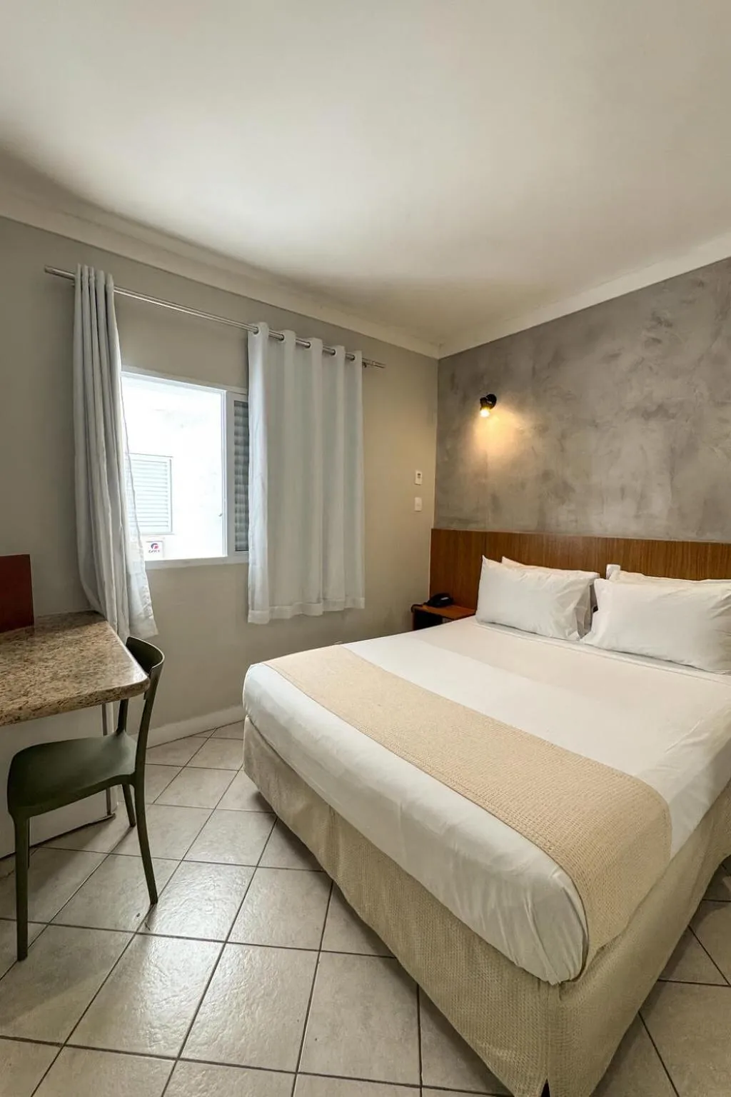 Bed in Ilha Porchat Hotel