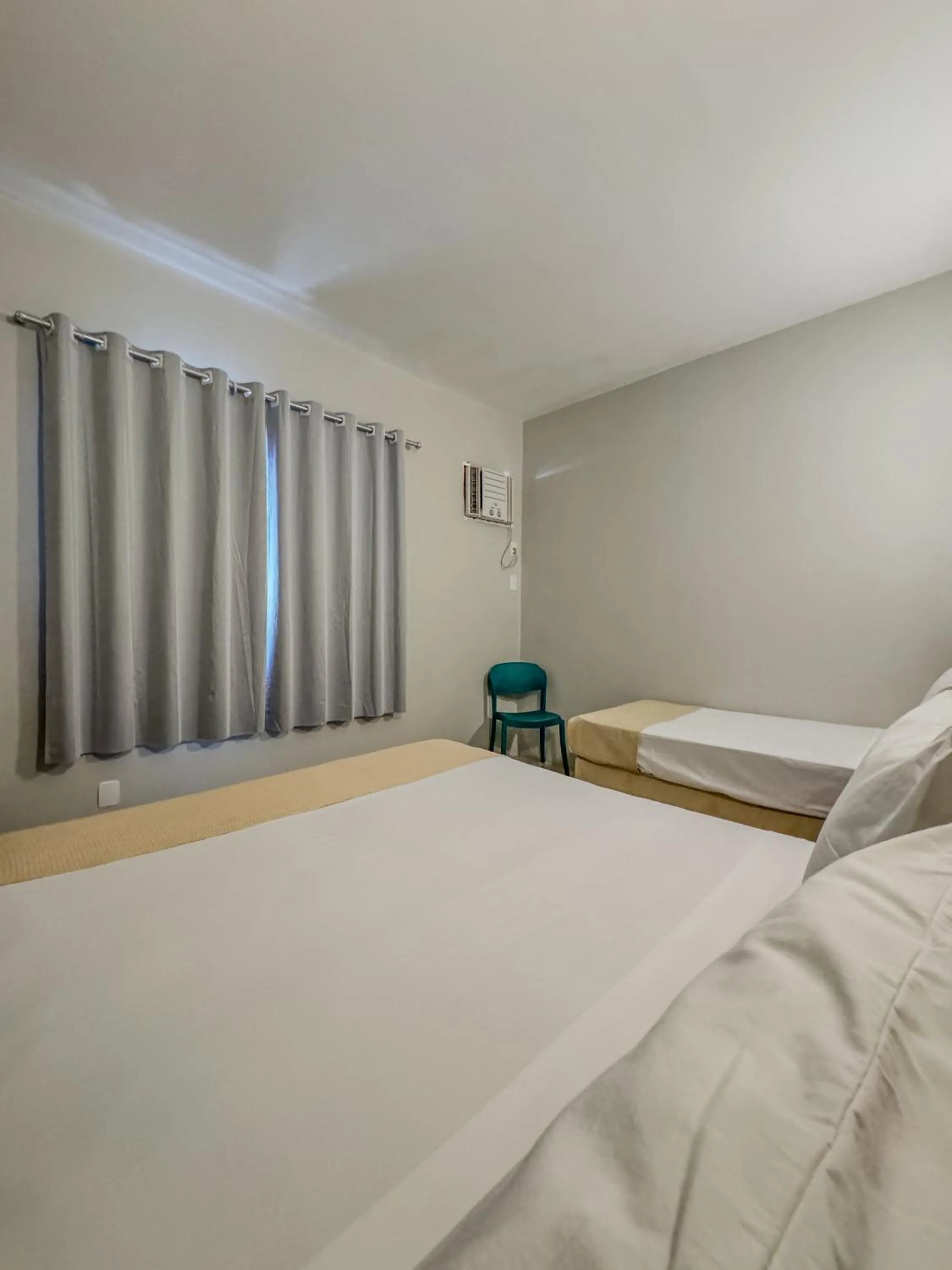 Photo of the whole room, Bed in Ilha Porchat Hotel