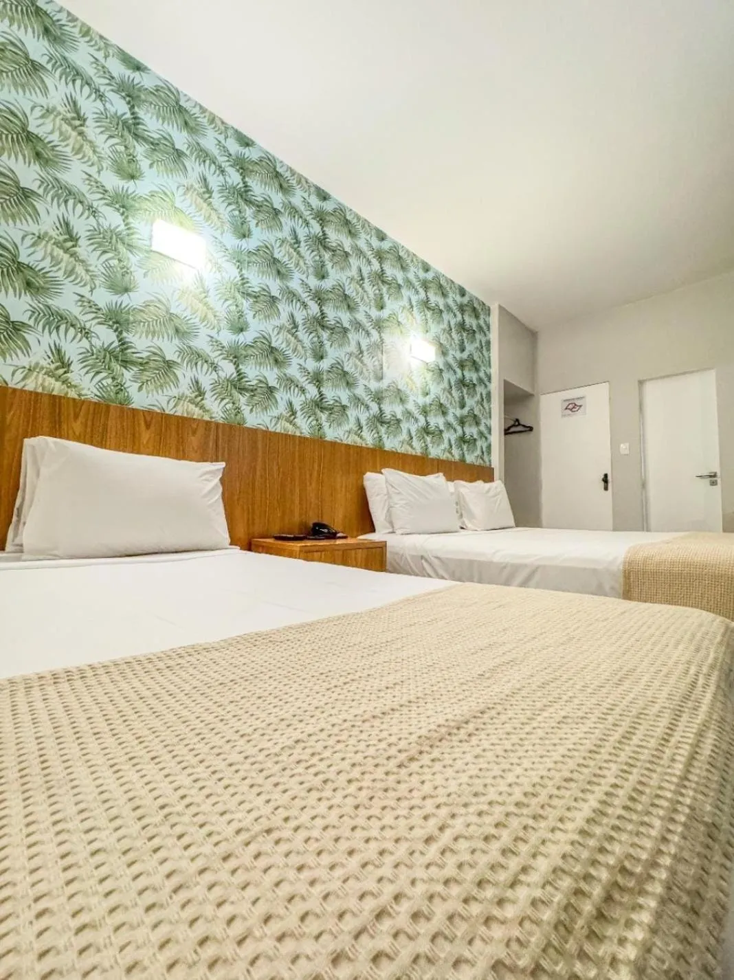 Bed in Ilha Porchat Hotel