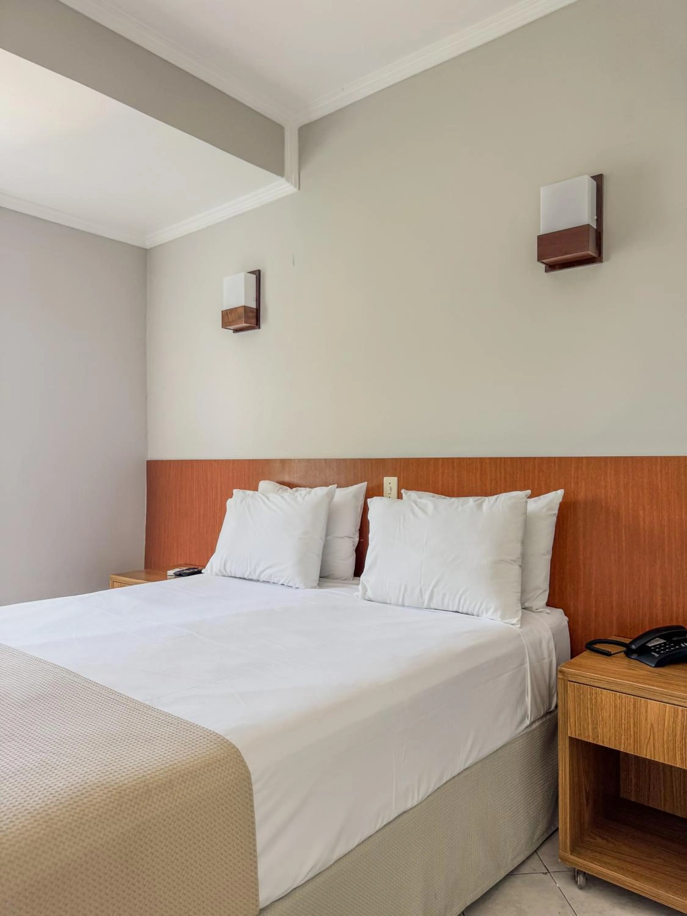 Bed in Ilha Porchat Hotel