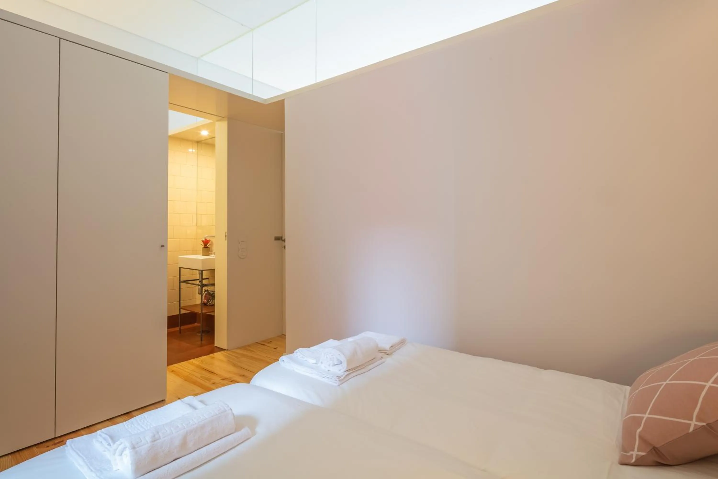 Bed in Indulge Porto Flats