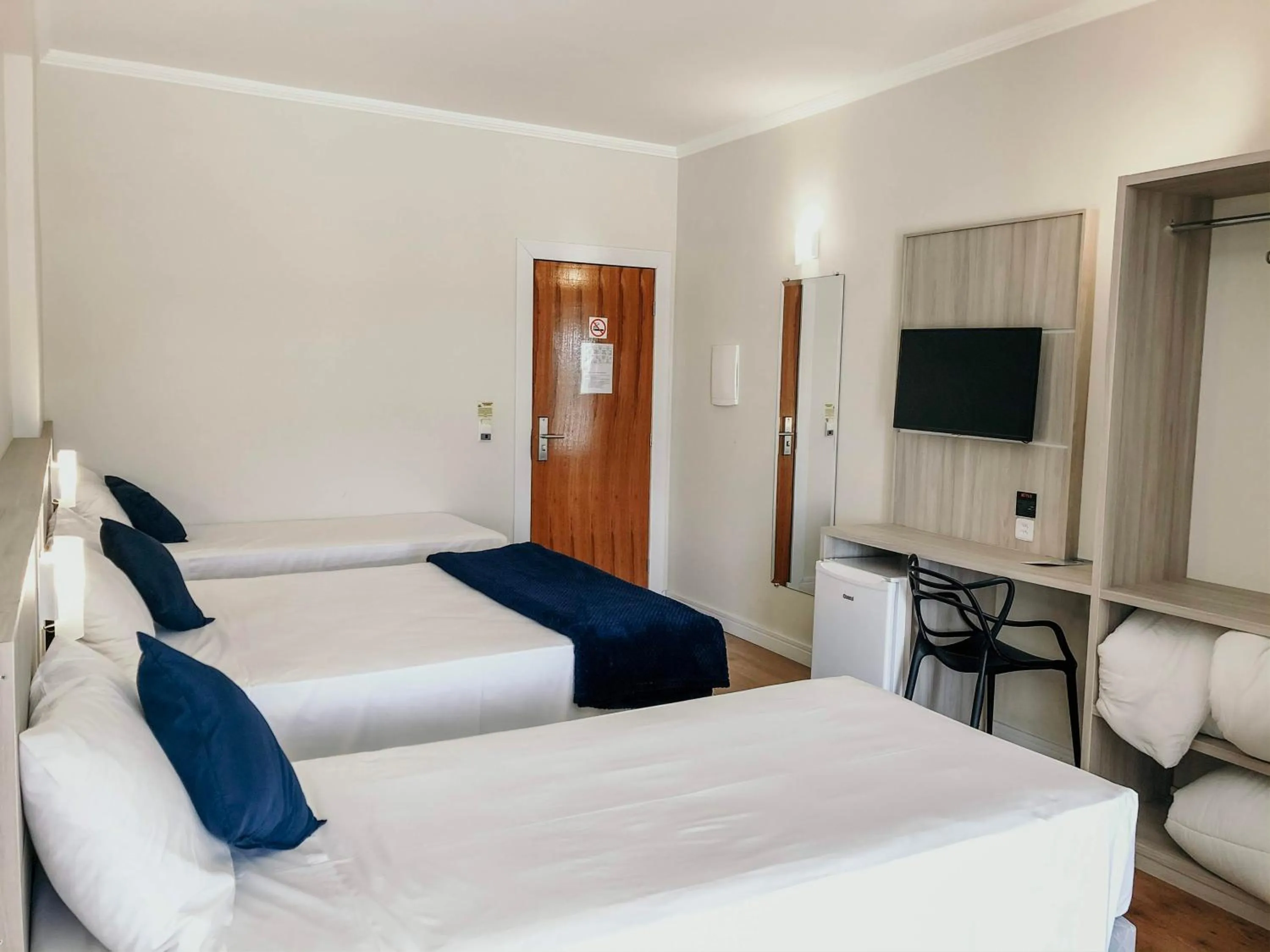 Photo of the whole room, Bed in Sense Hotel Araucária