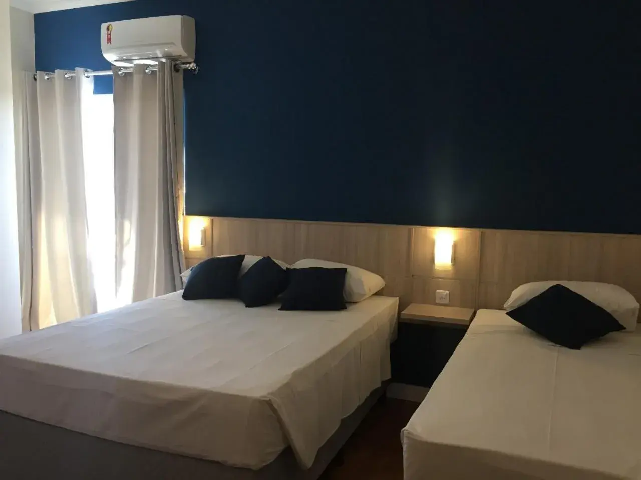 Standard Triple Room in Sense Hotel Araucária Standard Triple Room in Sense Hotel Araucária