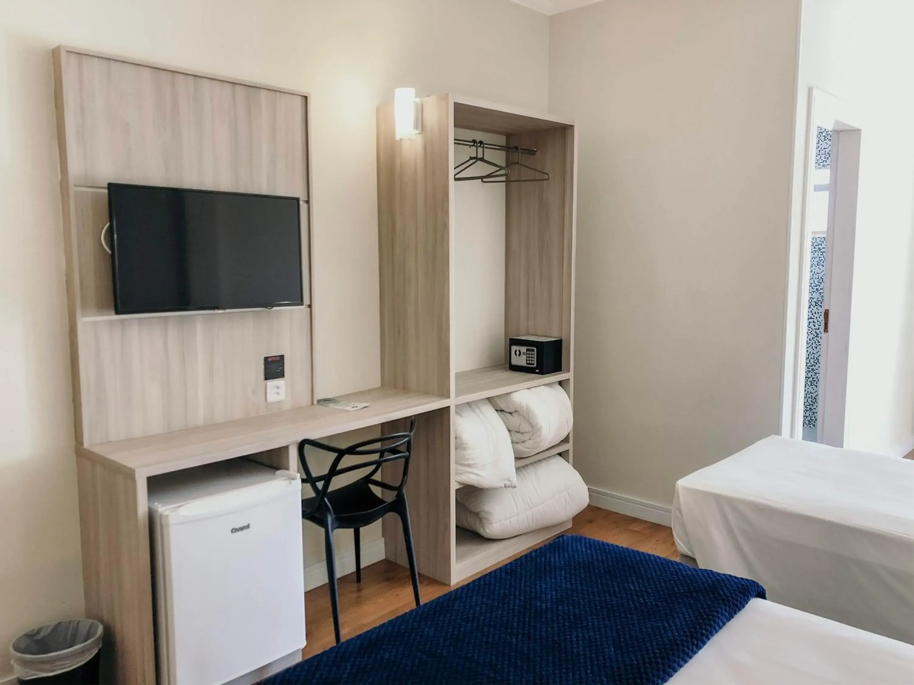 TV and multimedia, Bed in Sense Hotel Araucária TV and multimedia, Bed in Sense Hotel Araucária