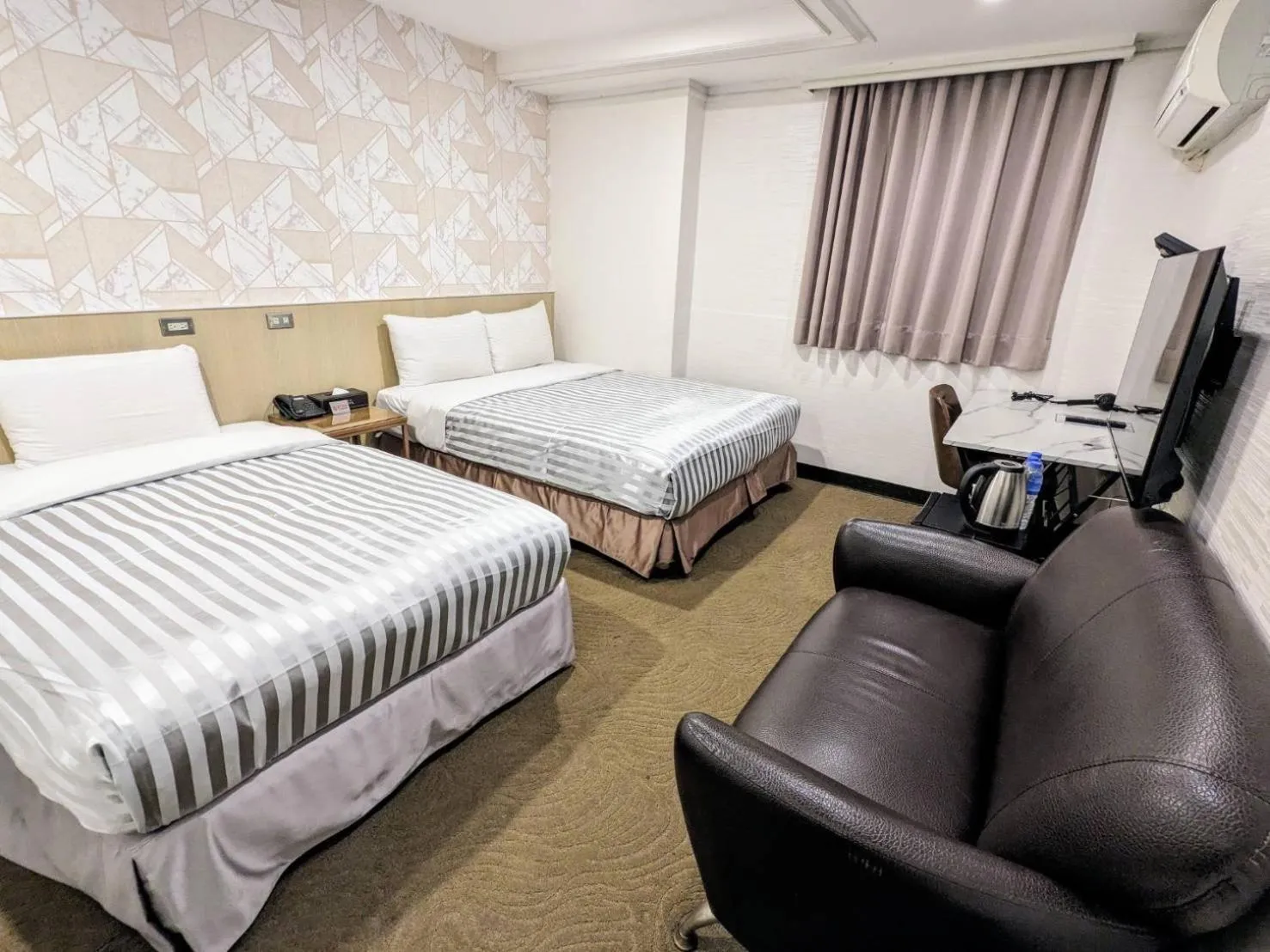 Bed in Ximen Hotel