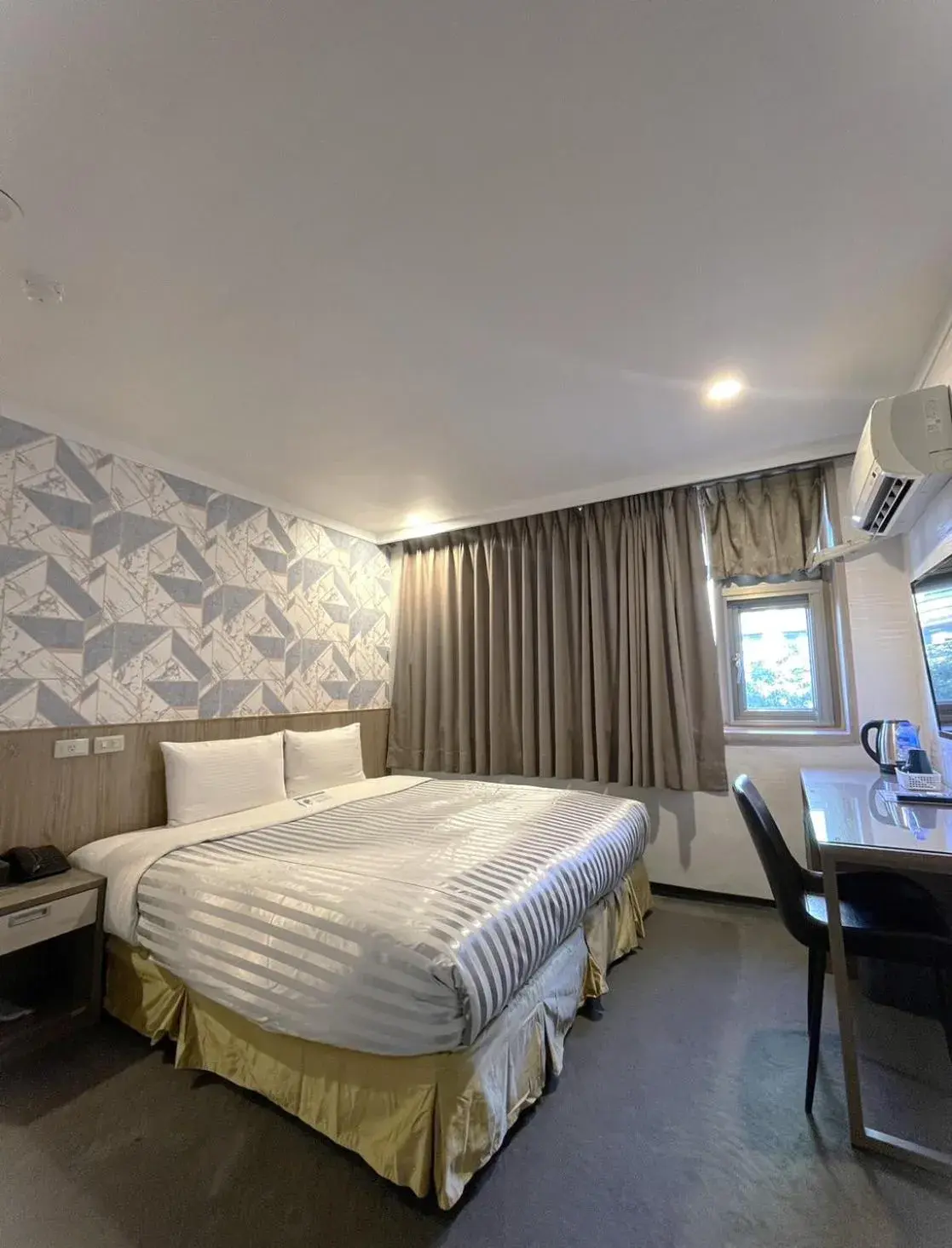 Bed in Ximen Hotel Bed in Ximen Hotel