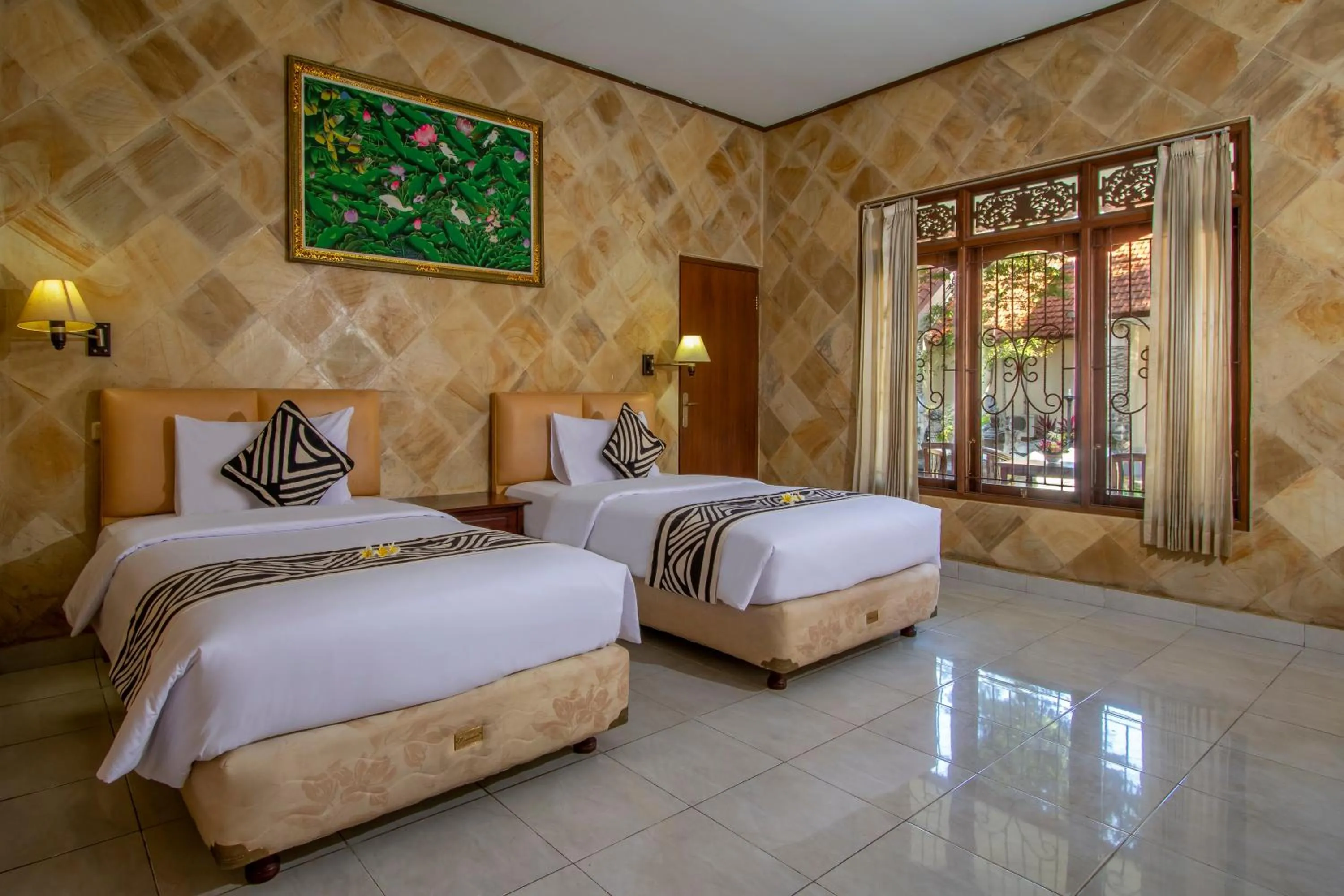 Bed in Suriwathi Hotel Legian