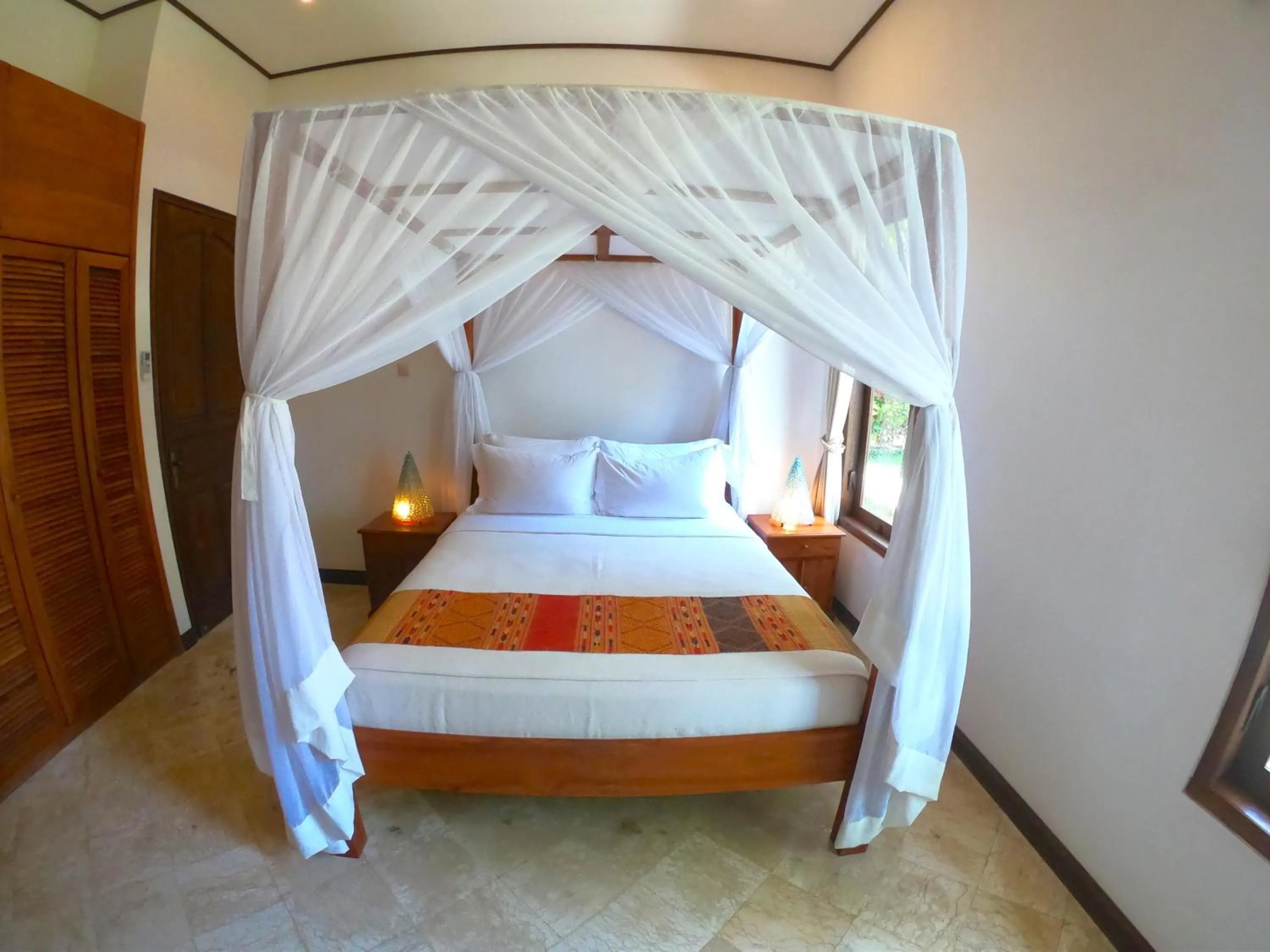 Bed in Agung Bali Nirwana Villas and Spa