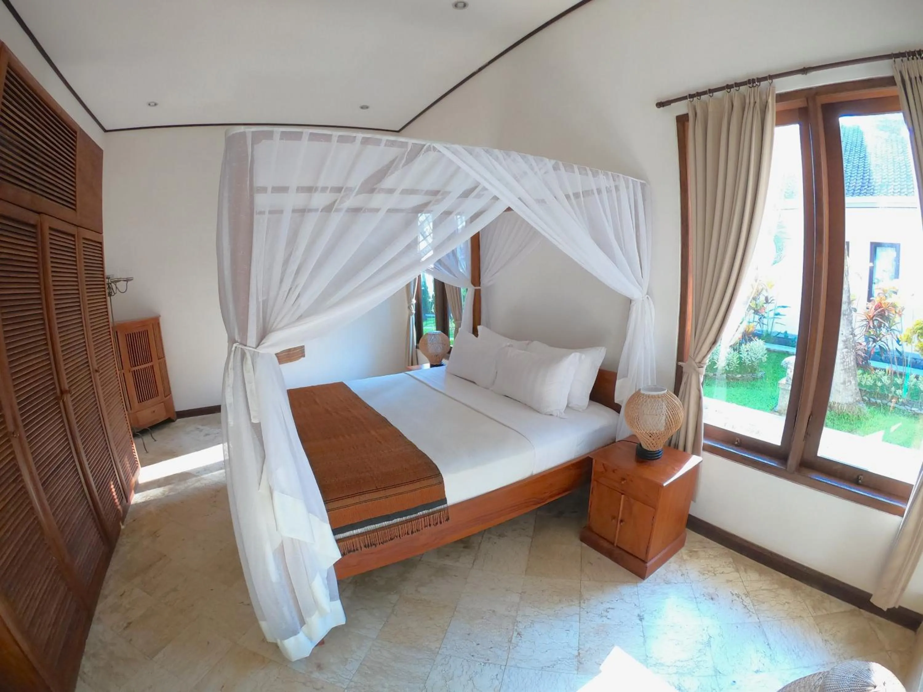 Bed in Agung Bali Nirwana Villas and Spa