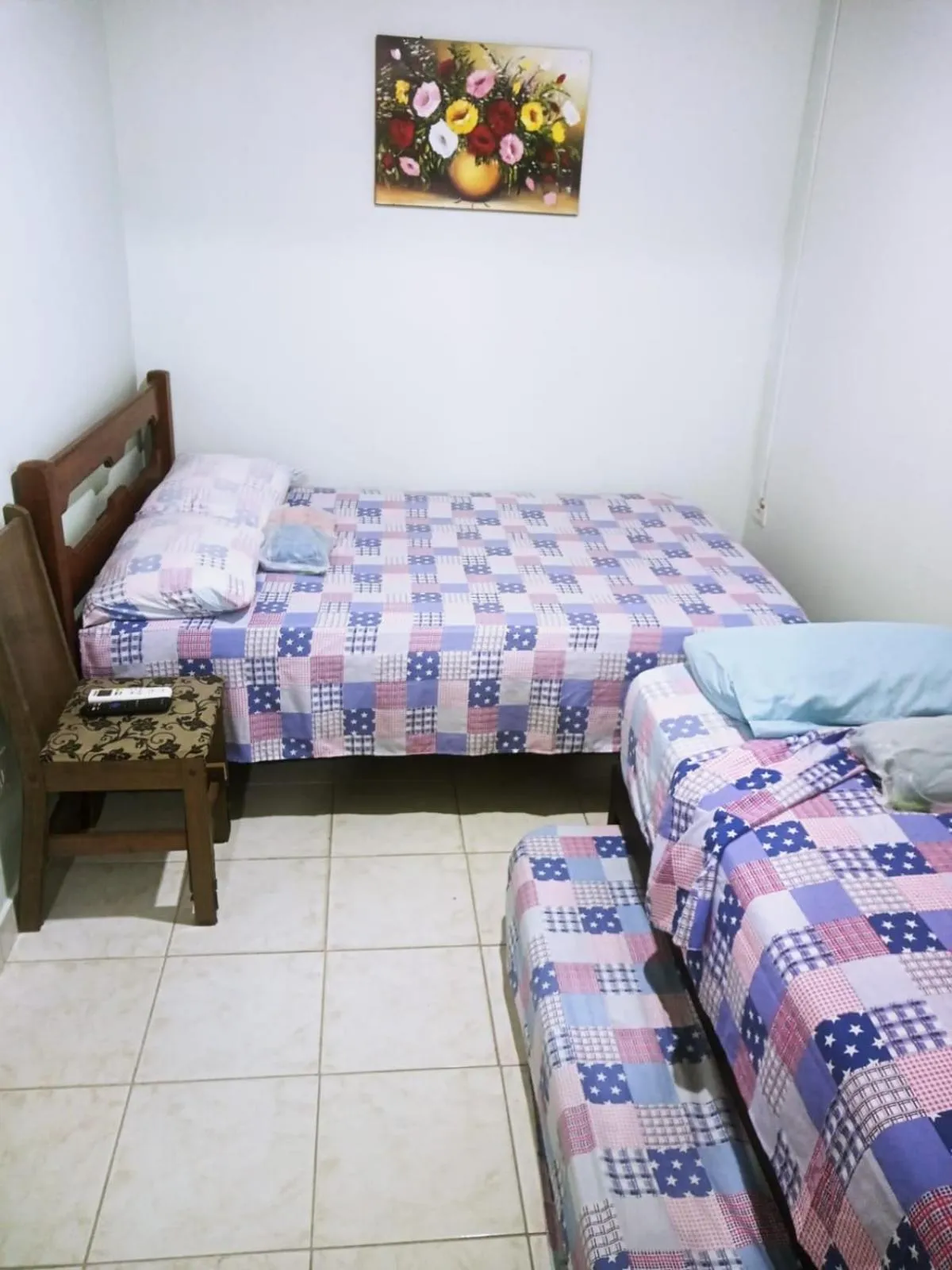 Bed in Pousada Reis Guarujá