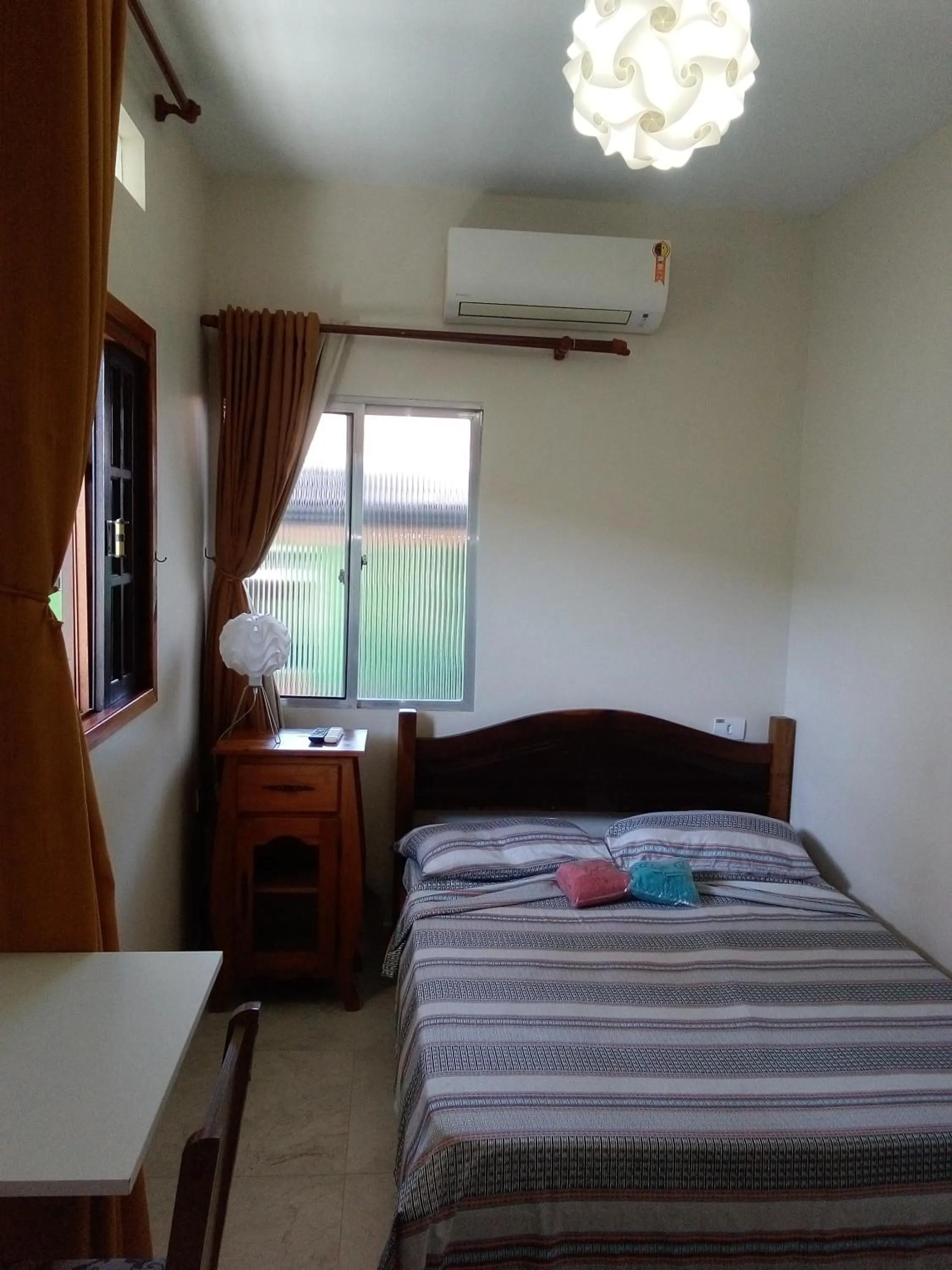 Bed in Pousada Reis Guarujá