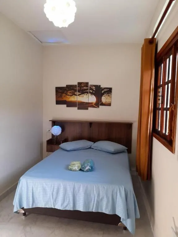 Bed in Pousada Reis Guarujá