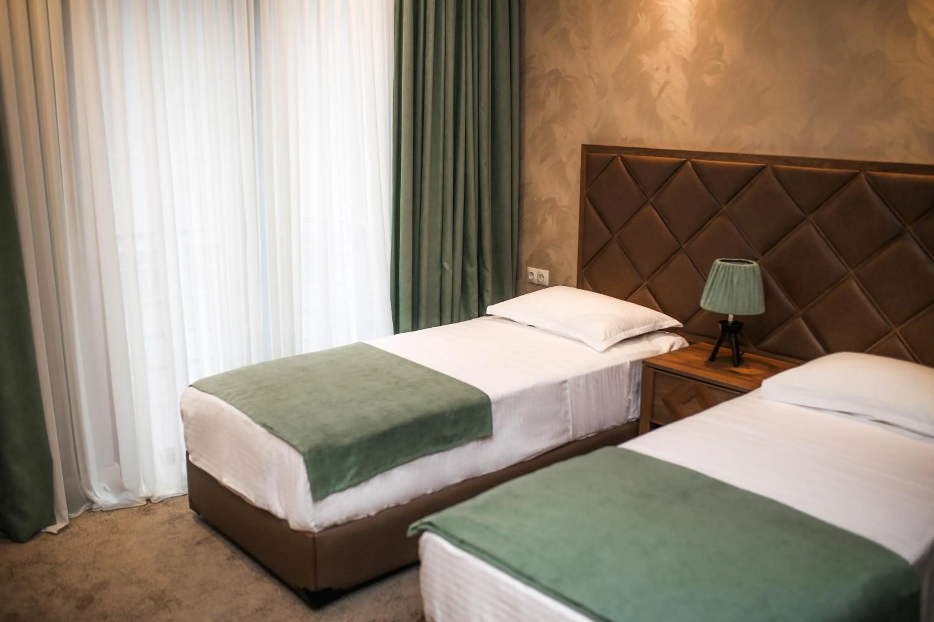 Bed in Boutique Hotel Mimino