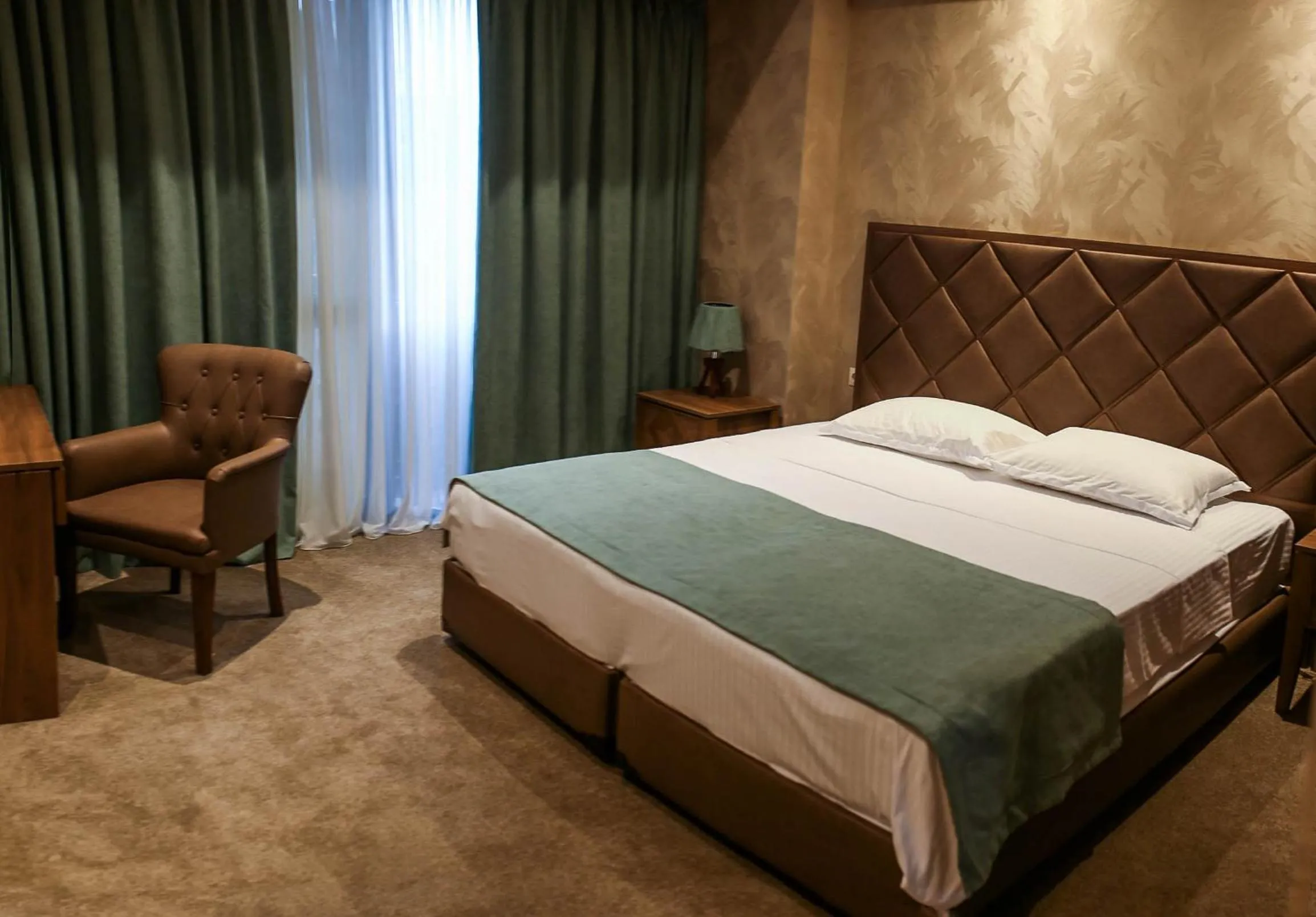 Bed in Boutique Hotel Mimino