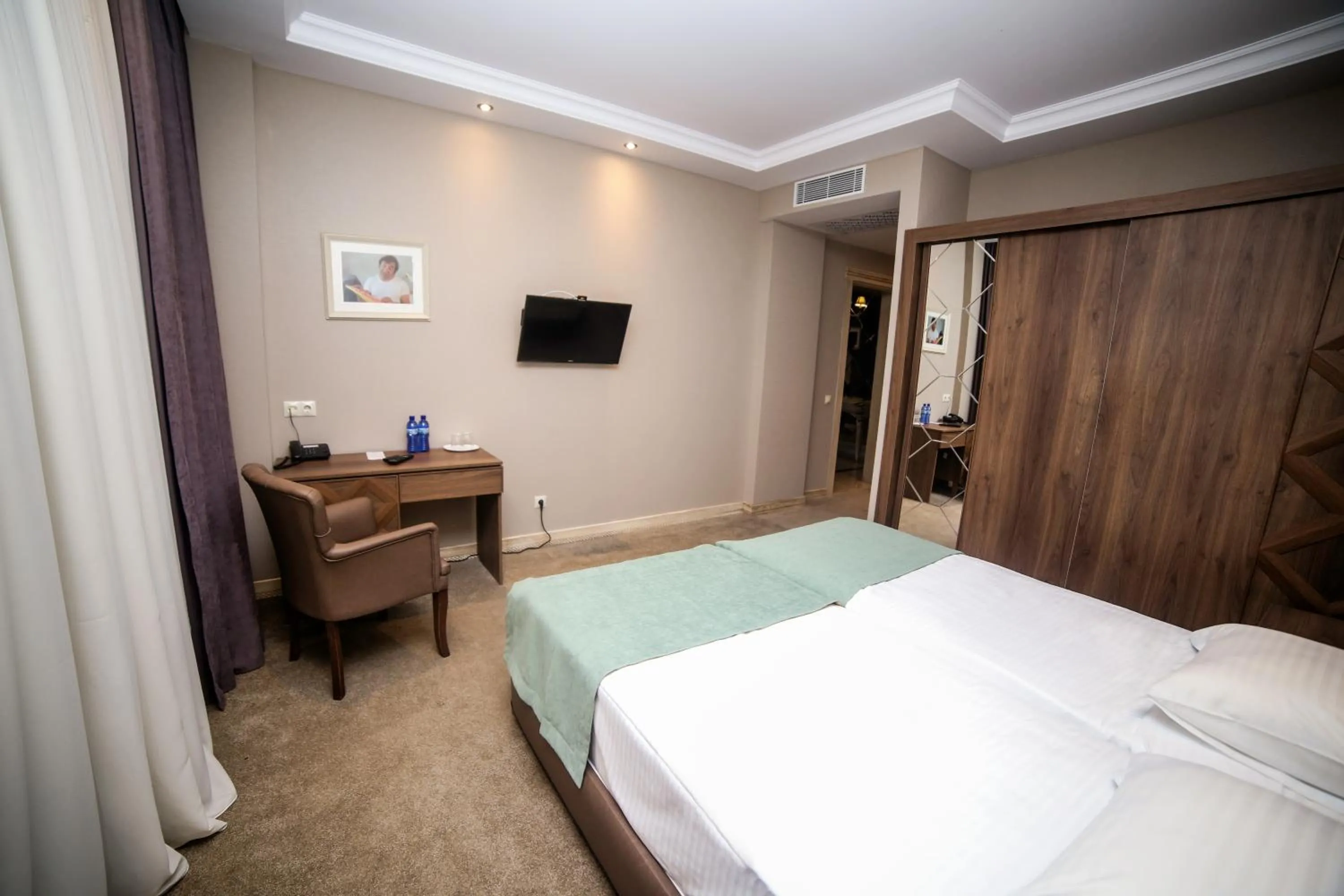 Bed in Boutique Hotel Mimino