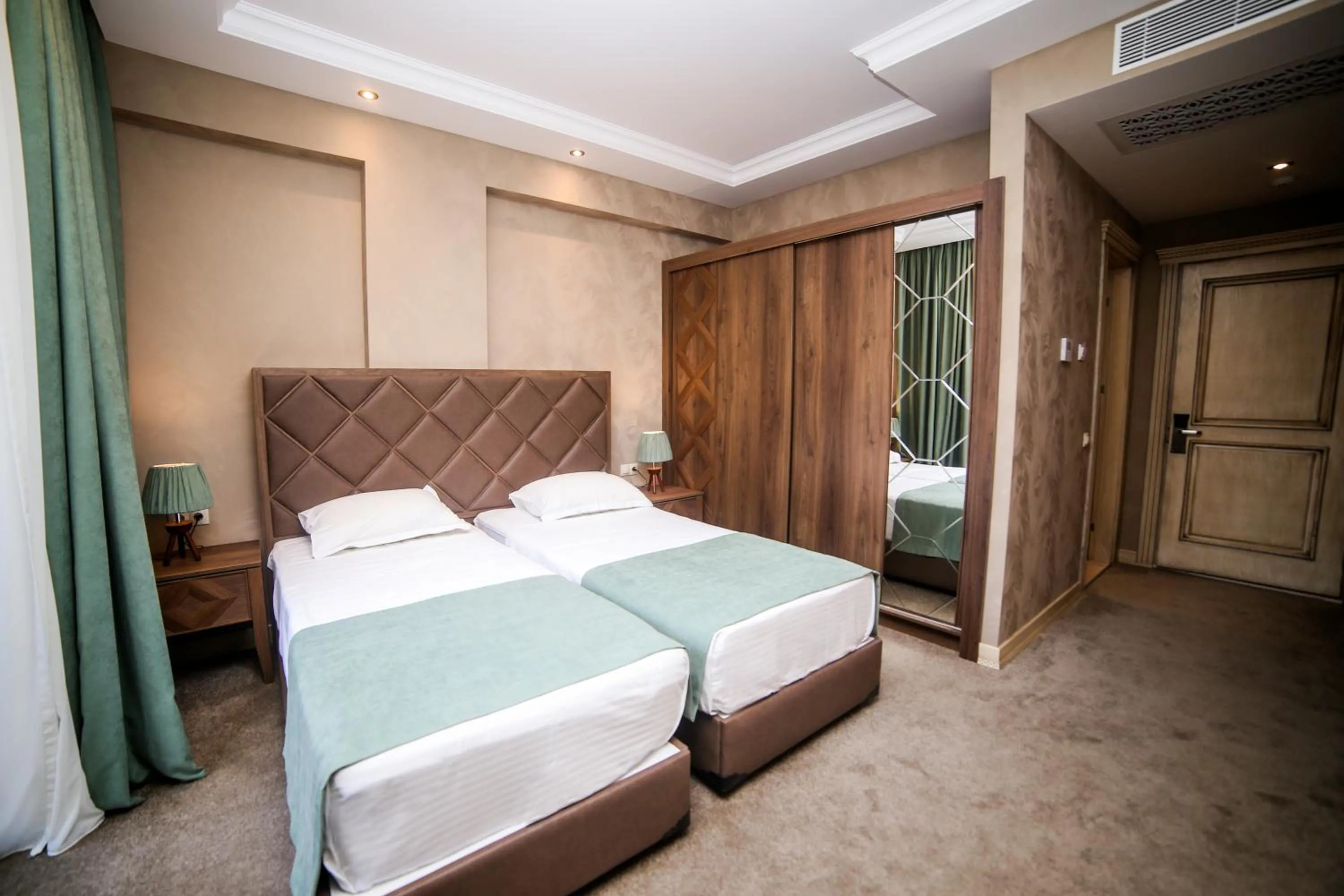 Bed in Boutique Hotel Mimino