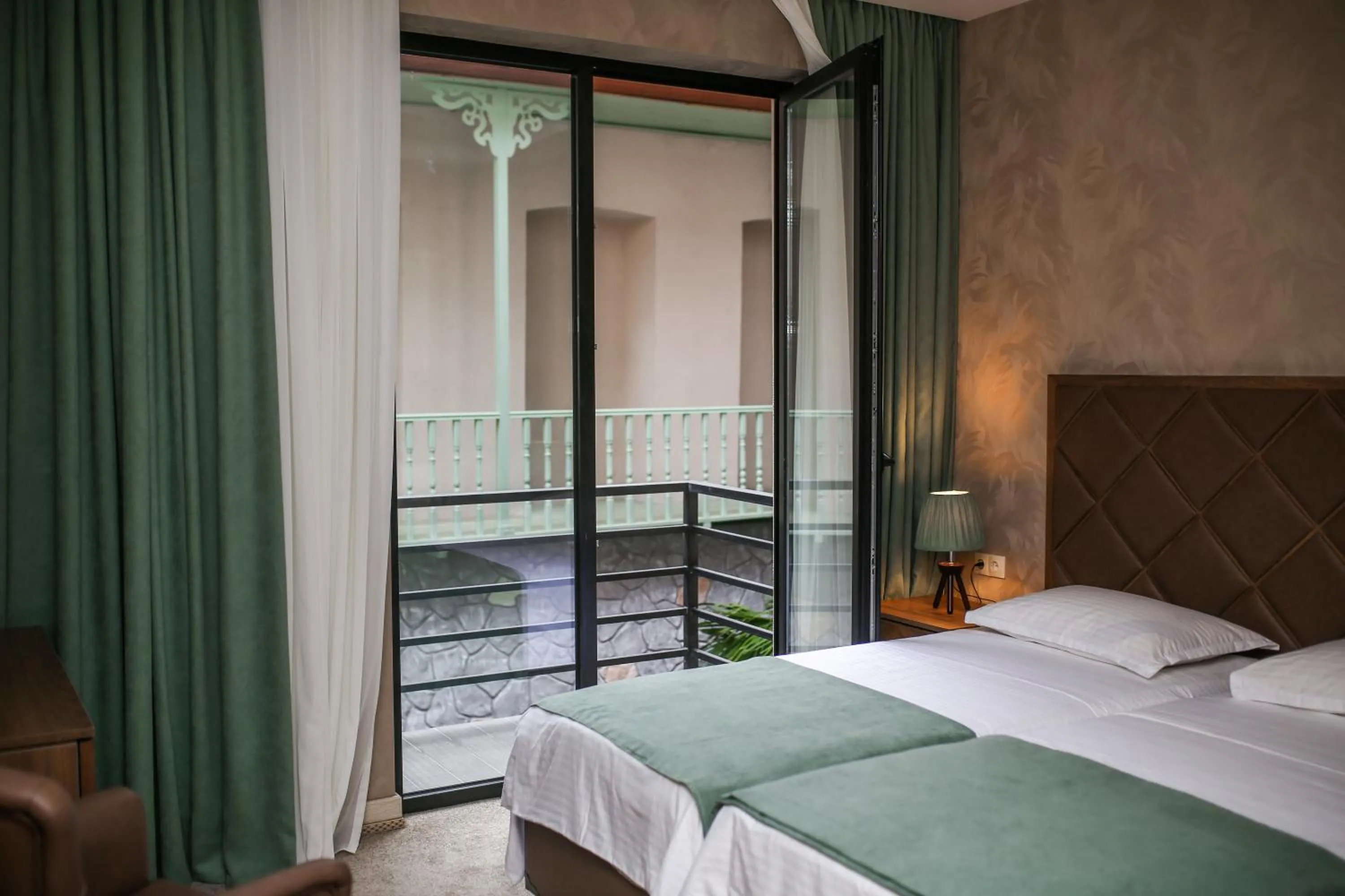 Bed in Boutique Hotel Mimino