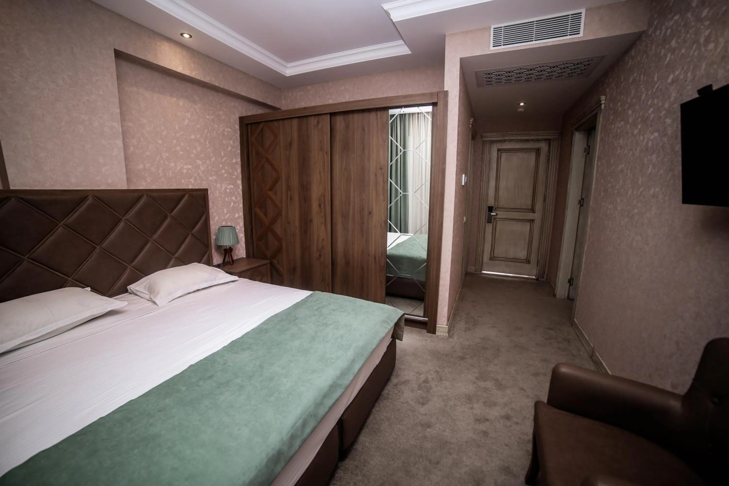 Bed in Boutique Hotel Mimino