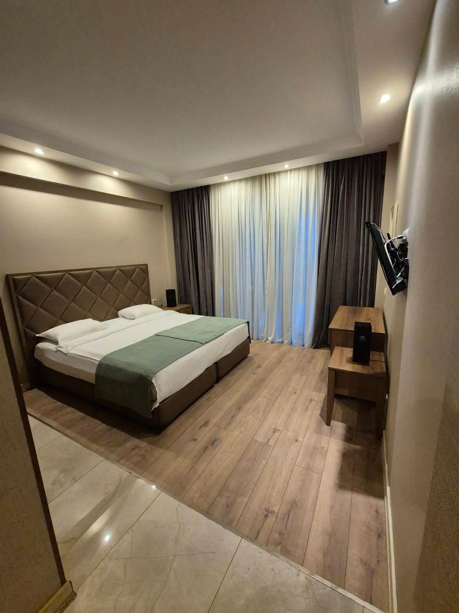Bed in Boutique Hotel Mimino