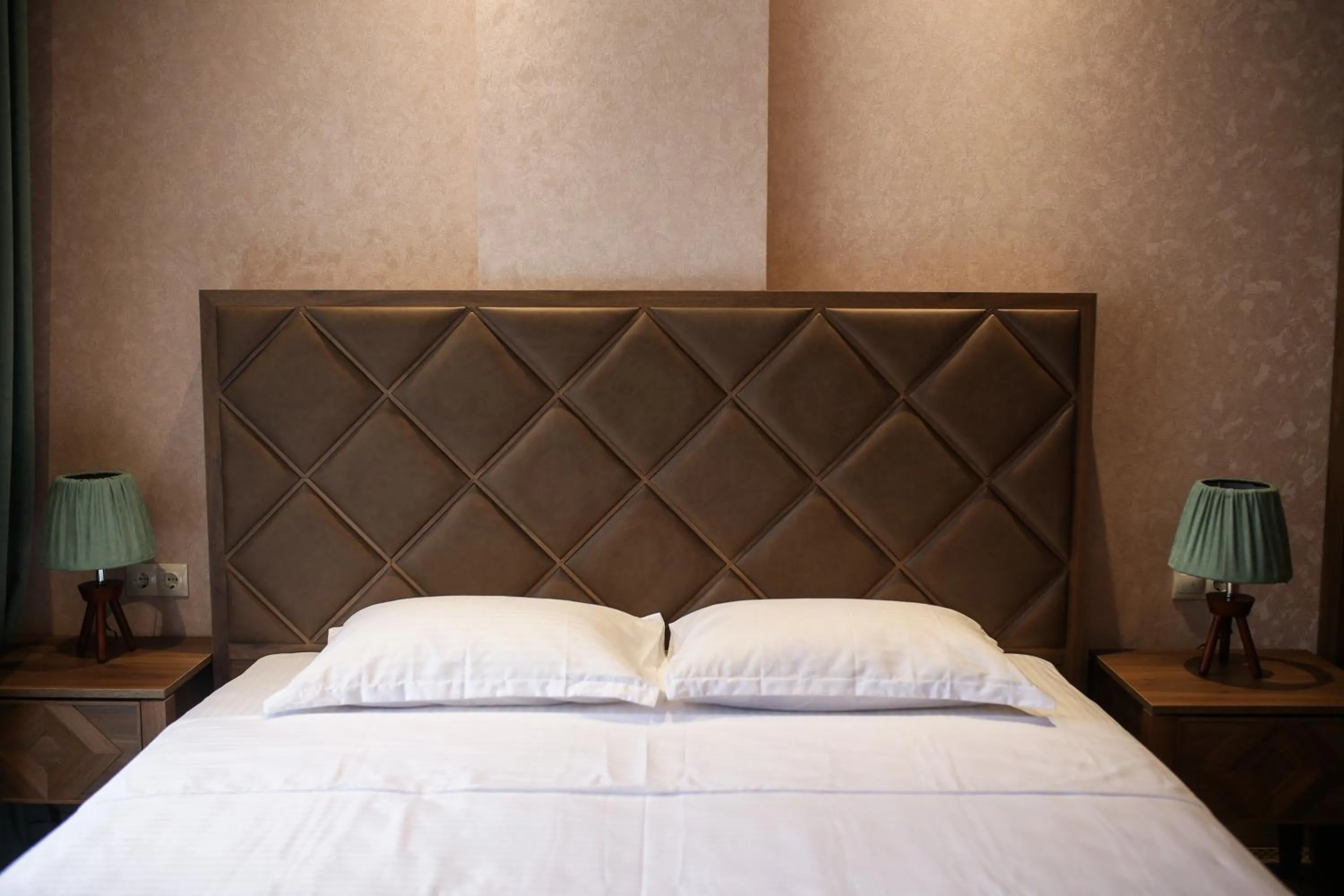 Bed in Boutique Hotel Mimino