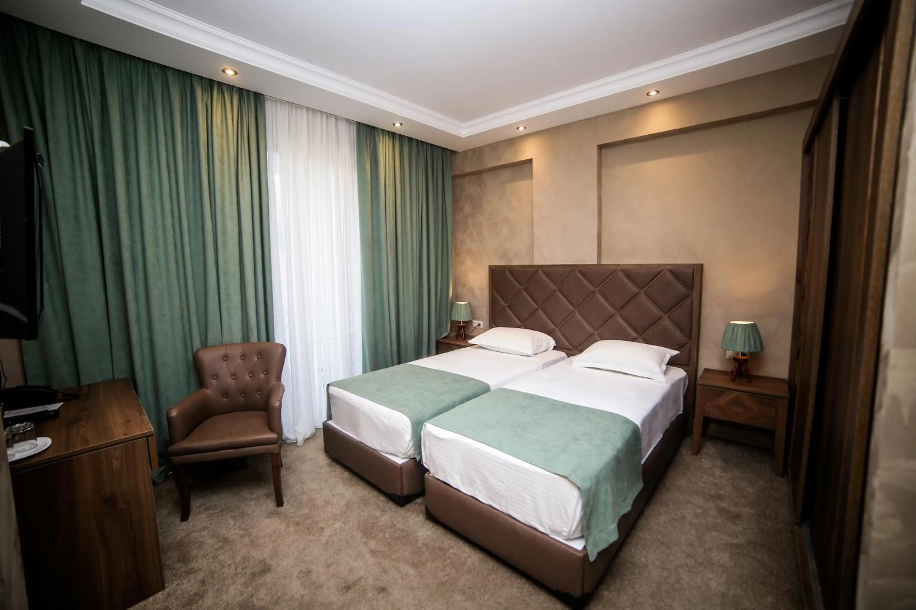 Bed in Boutique Hotel Mimino