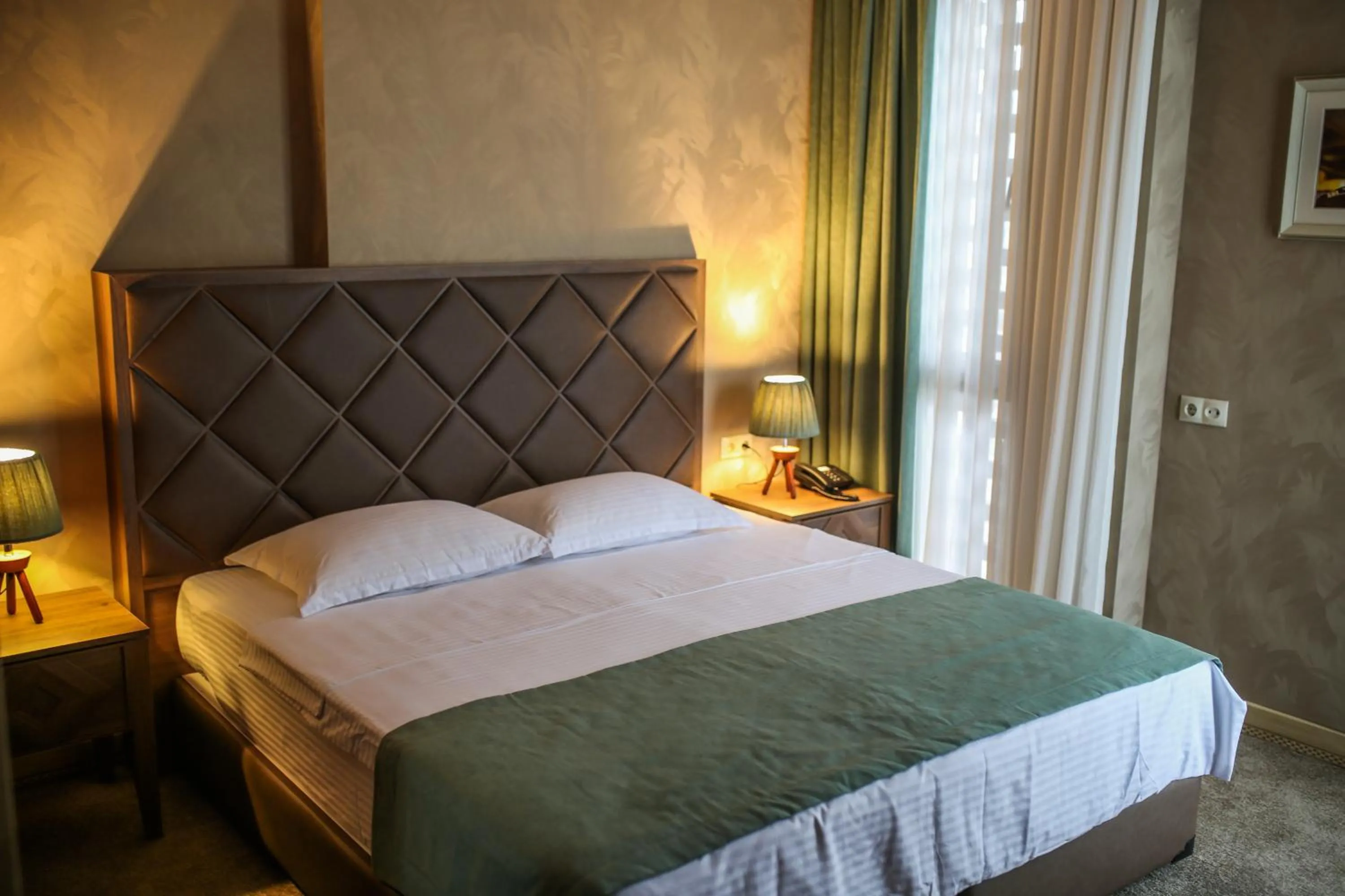 Bed in Boutique Hotel Mimino