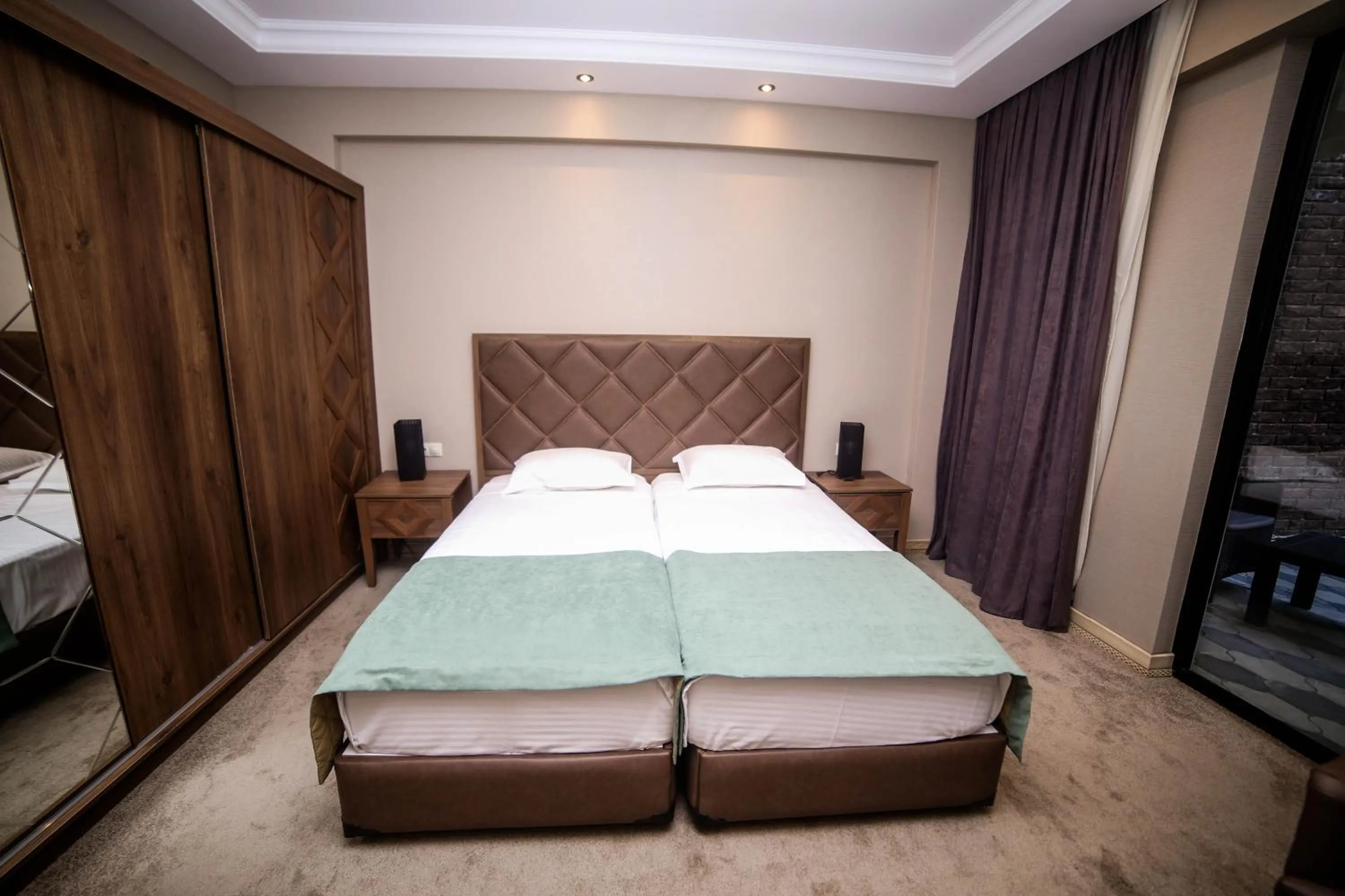 Bed in Boutique Hotel Mimino