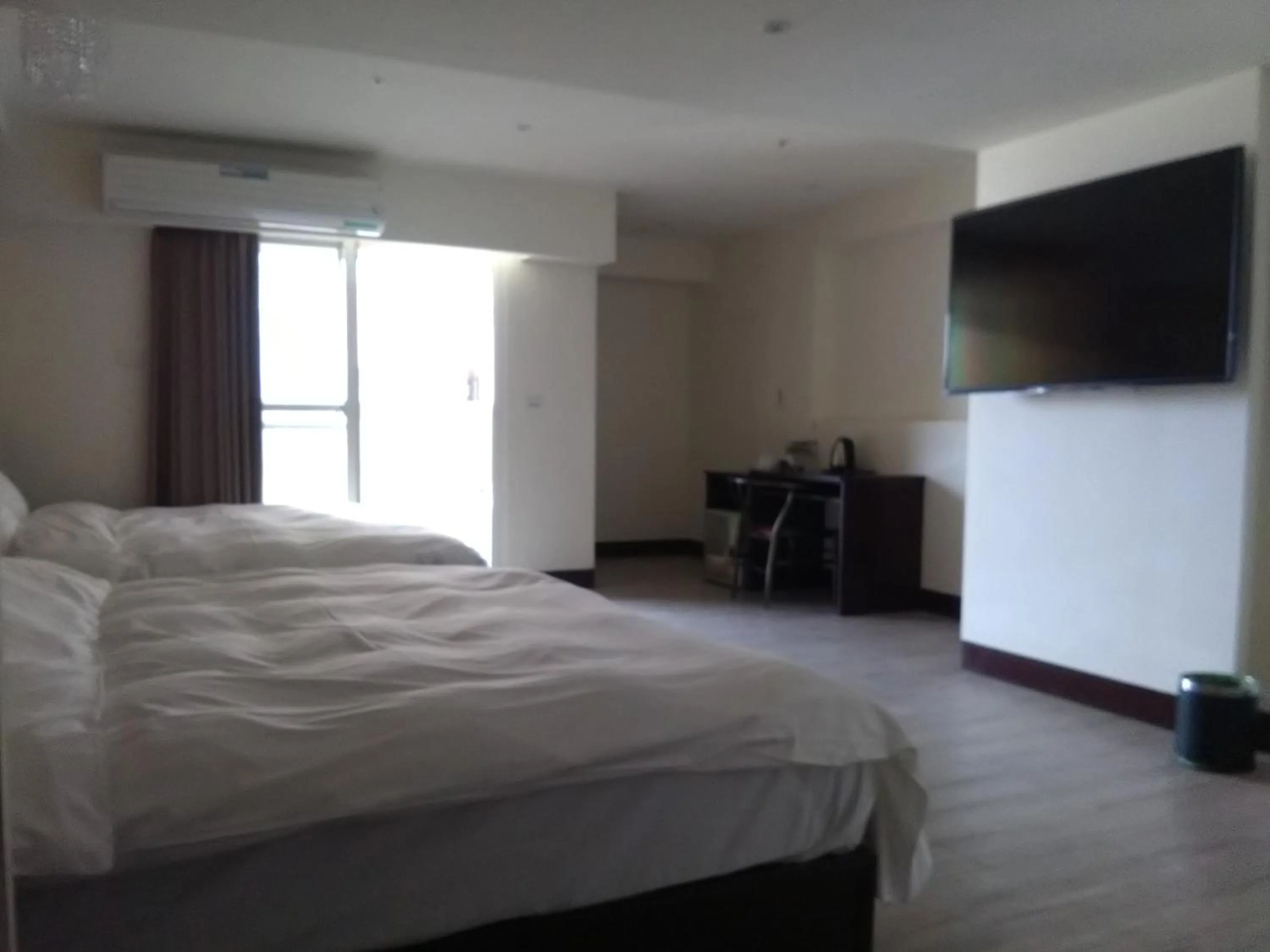 Bed in Dengfeng Milan Business Hotel