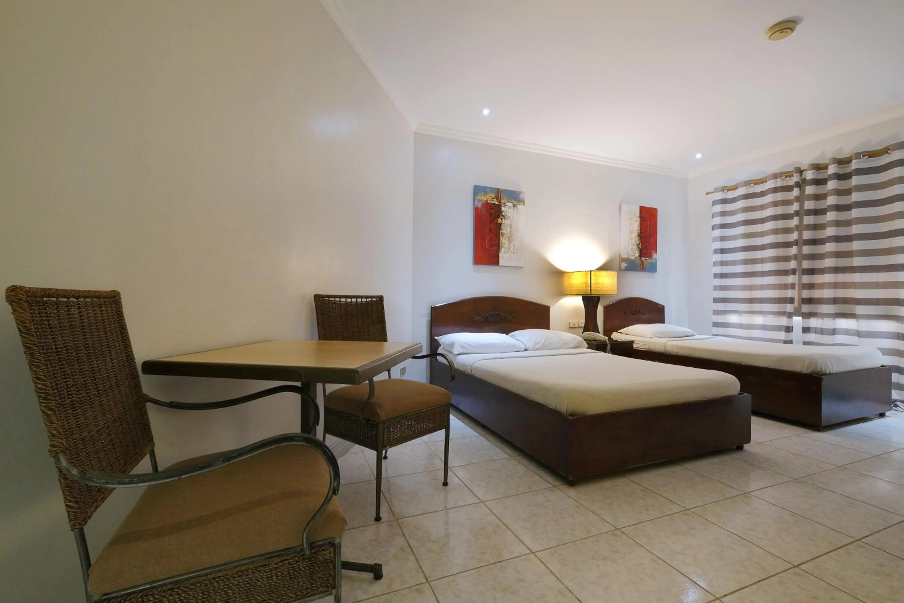 Photo of the whole room, Bed in Palazzo Pensionne