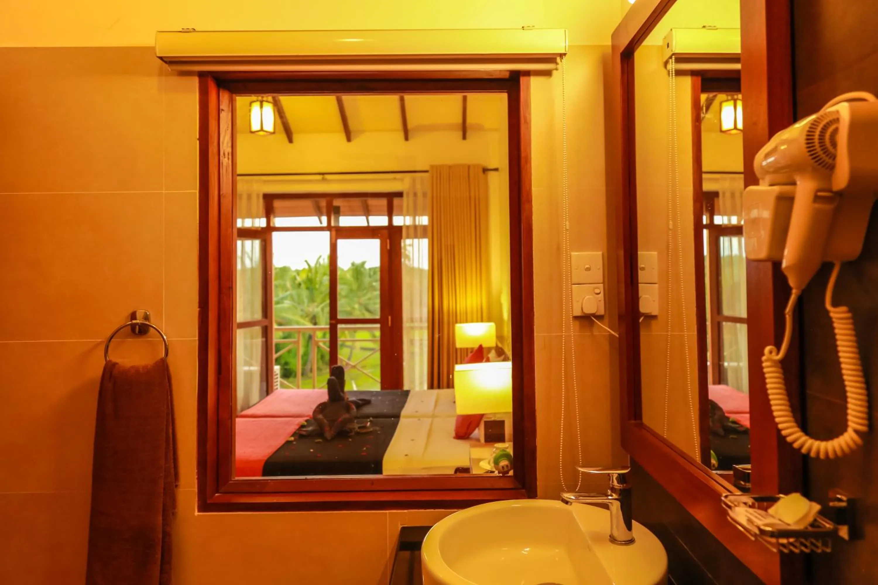 Bathroom in Pelwehera Village Resort